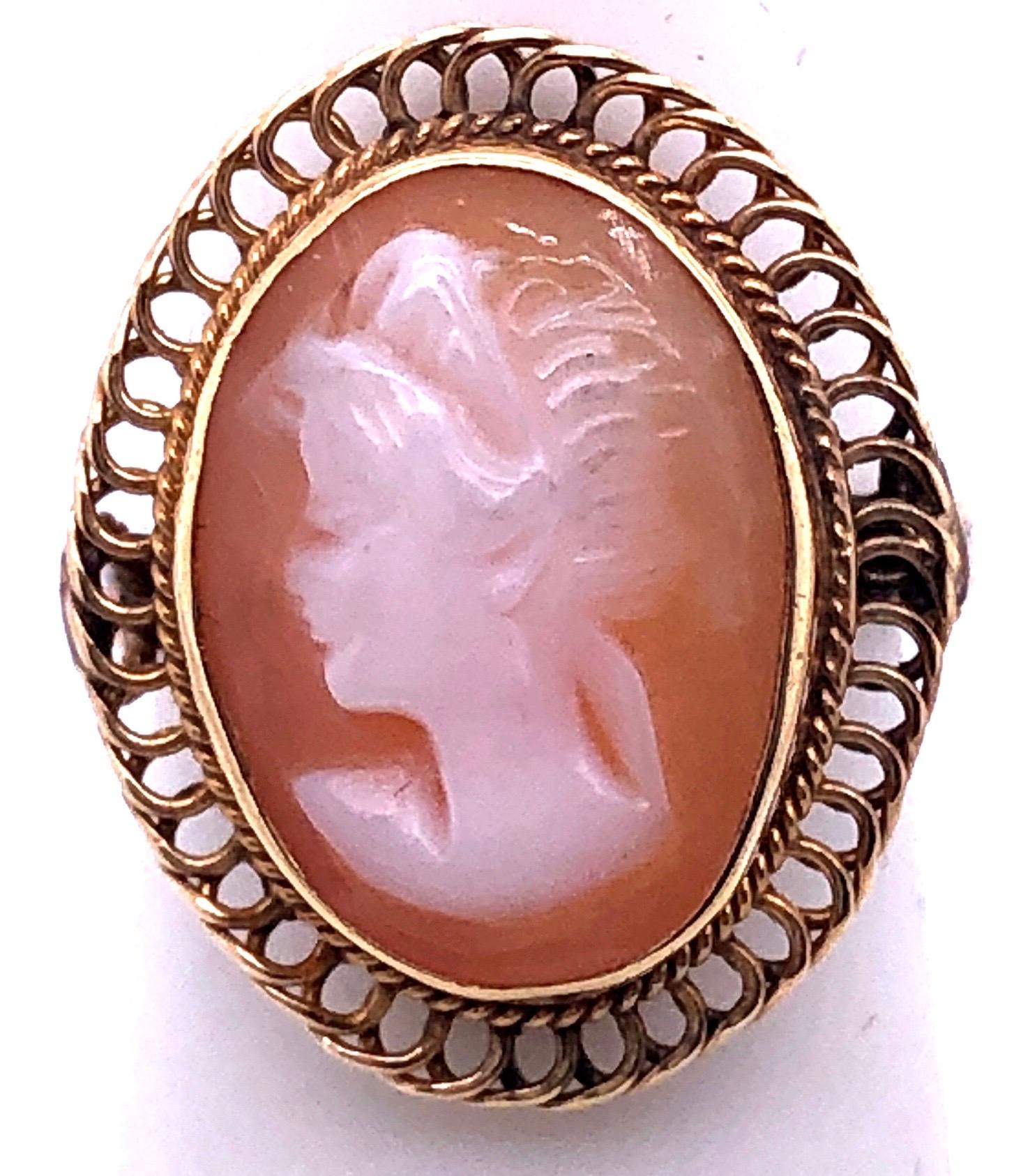 14 Karat Yellow Gold Swirl Framed Cameo Ring Size 6.5.
3 grams total weight.

*This ring can be resized at your local jeweler if need.