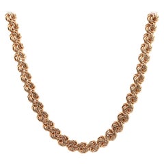 14 Karat Yellow Gold Swirl Link Necklace