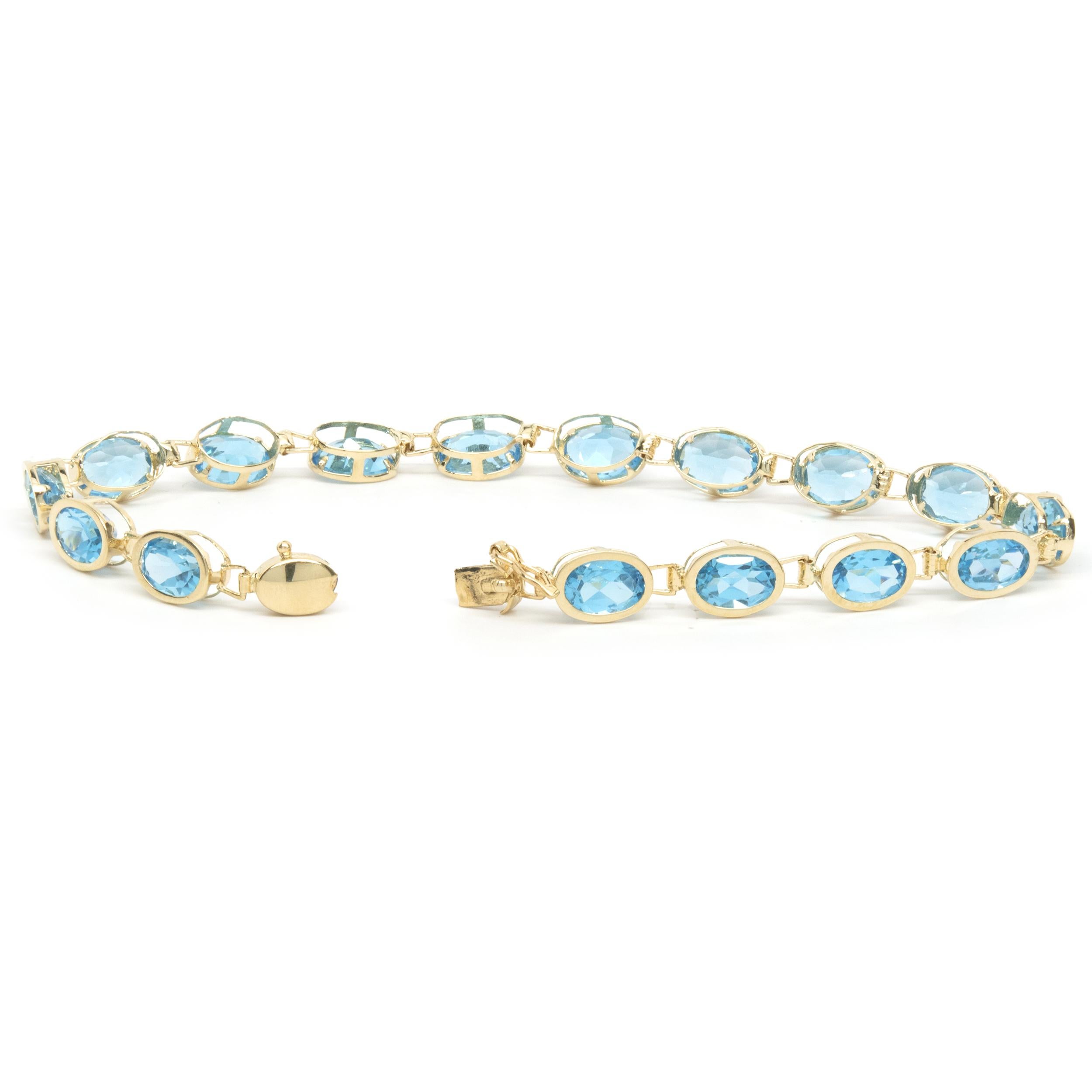 blue topaz bracelet yellow gold