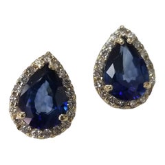 14 Karat Yellow Gold Synthetic Sapphire and Diamond Pear Shape Halos