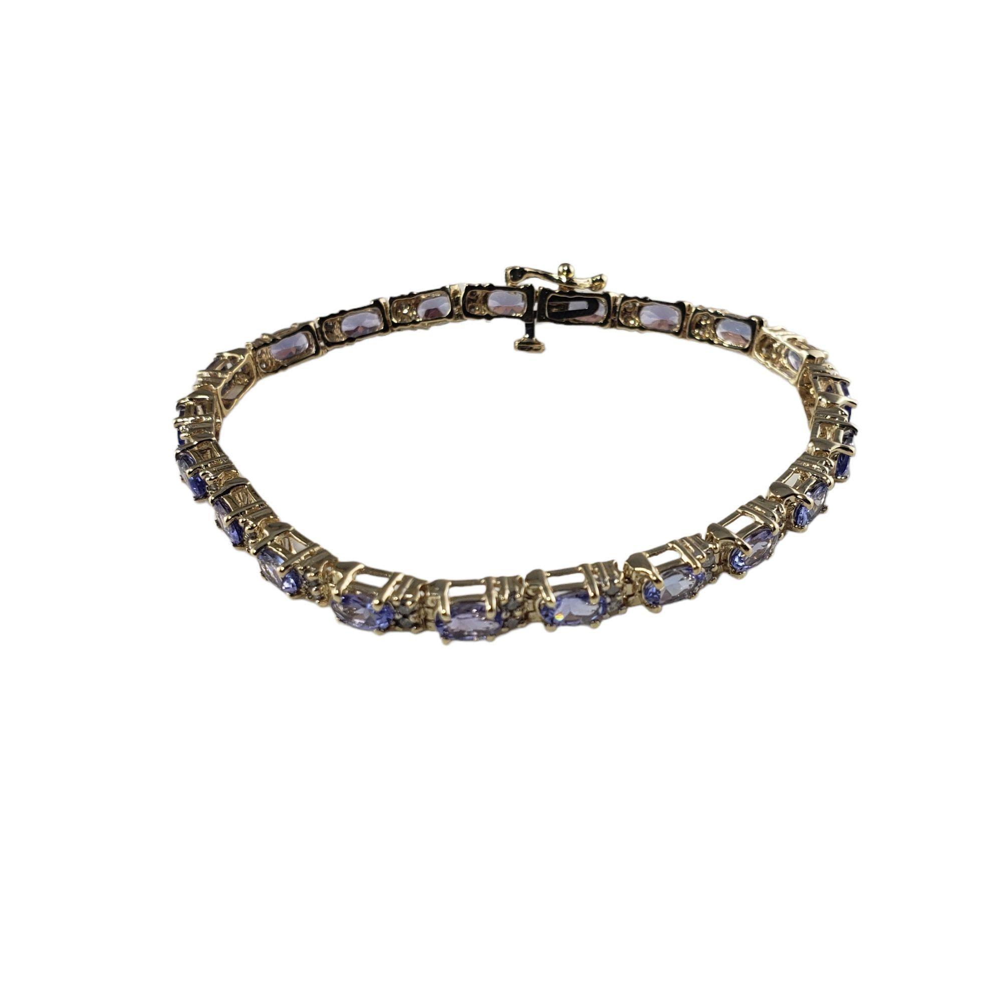 Taille ovale Bracelet en or jaune 14 carats avec tanzanite et diamants n° 13734 en vente