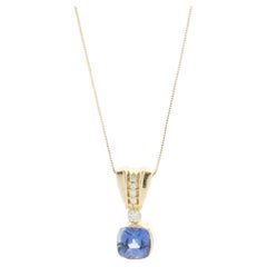 14 Karat Yellow Gold Tanzanite and Diamond Drop Necklace 14 Karat Yellow Gold Tanzanite and Diamond Drop Necklace