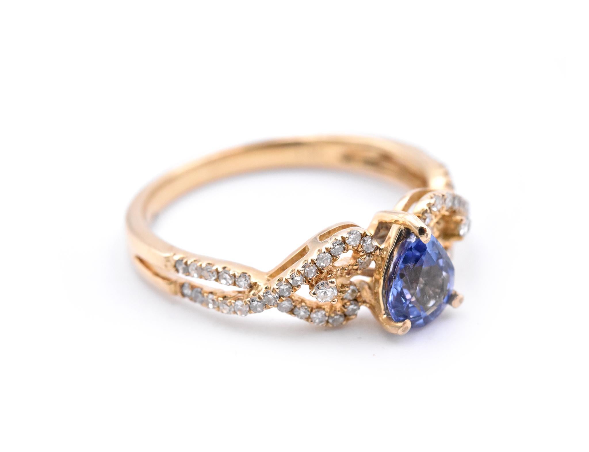 Material: 14k Yellow gold
Gemstones: Tanzanite = .35ct Pear Cut
Certification: AGI 26002
Diamonds: 54 round brilliant cuts = .31cttw
Color: G
Clarity: VS-SI
Ring Size: 7.5 (please allow two additional shipping days for sizing requests)
Dimensions: