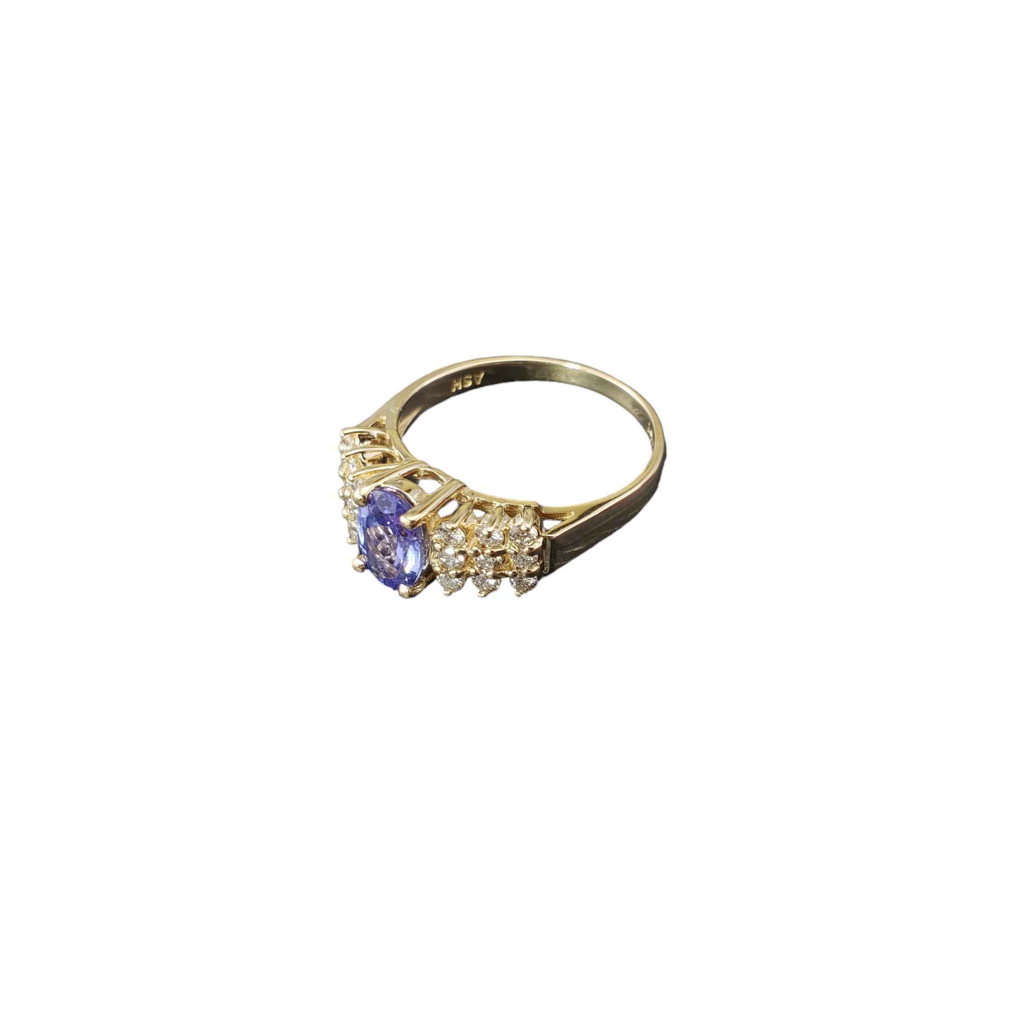 Taille ovale Bague en or jaune 14 carats avec tanzanite et diamants taille 6,75  #17868 en vente