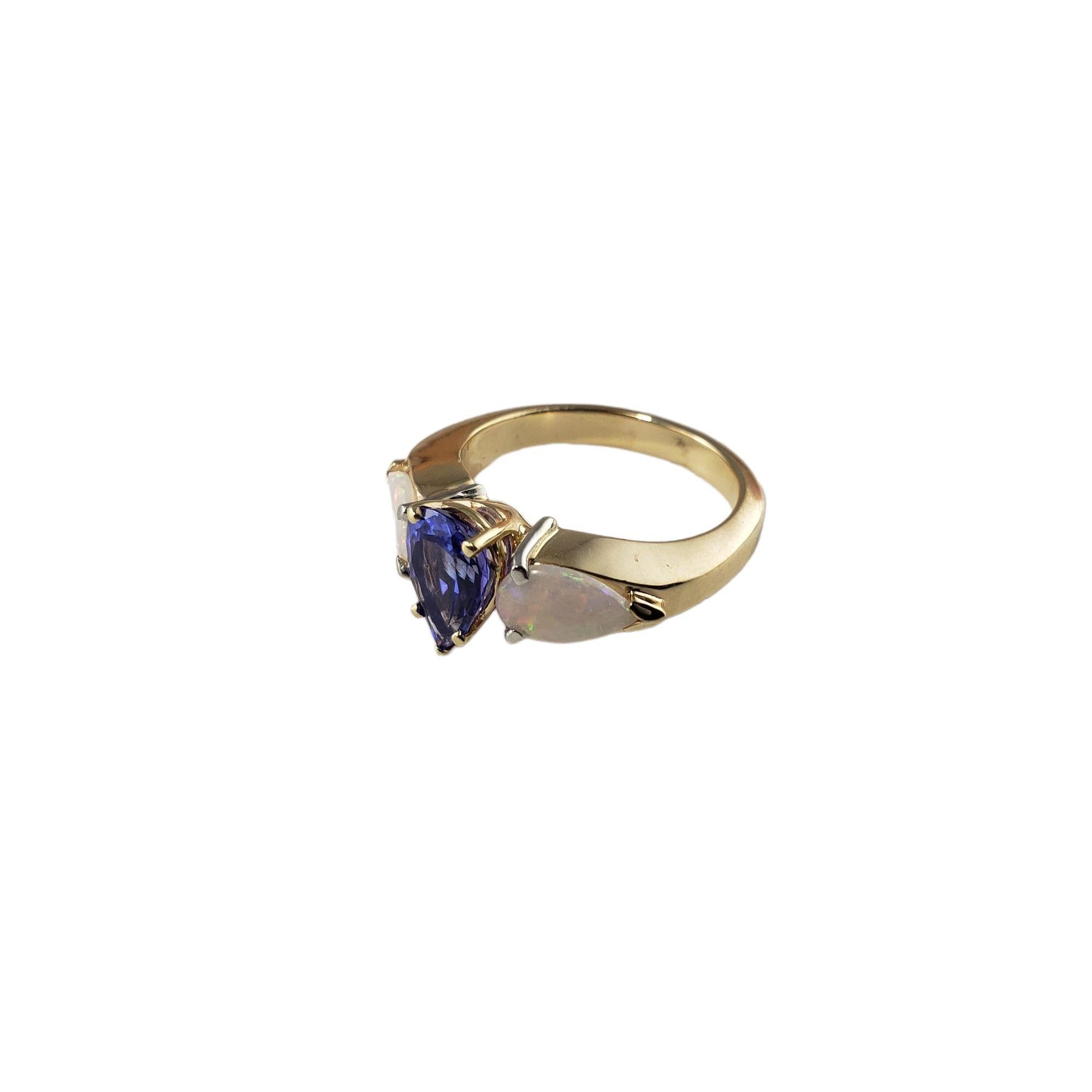 Pear Cut 14 Karat Yellow Gold Tanzanite and Opal Ring #13769 For Sale