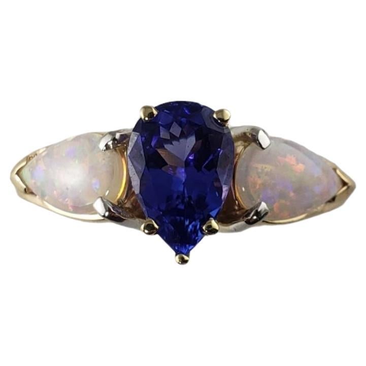 14 Karat Yellow Gold Tanzanite and Opal Ring #13769 For Sale