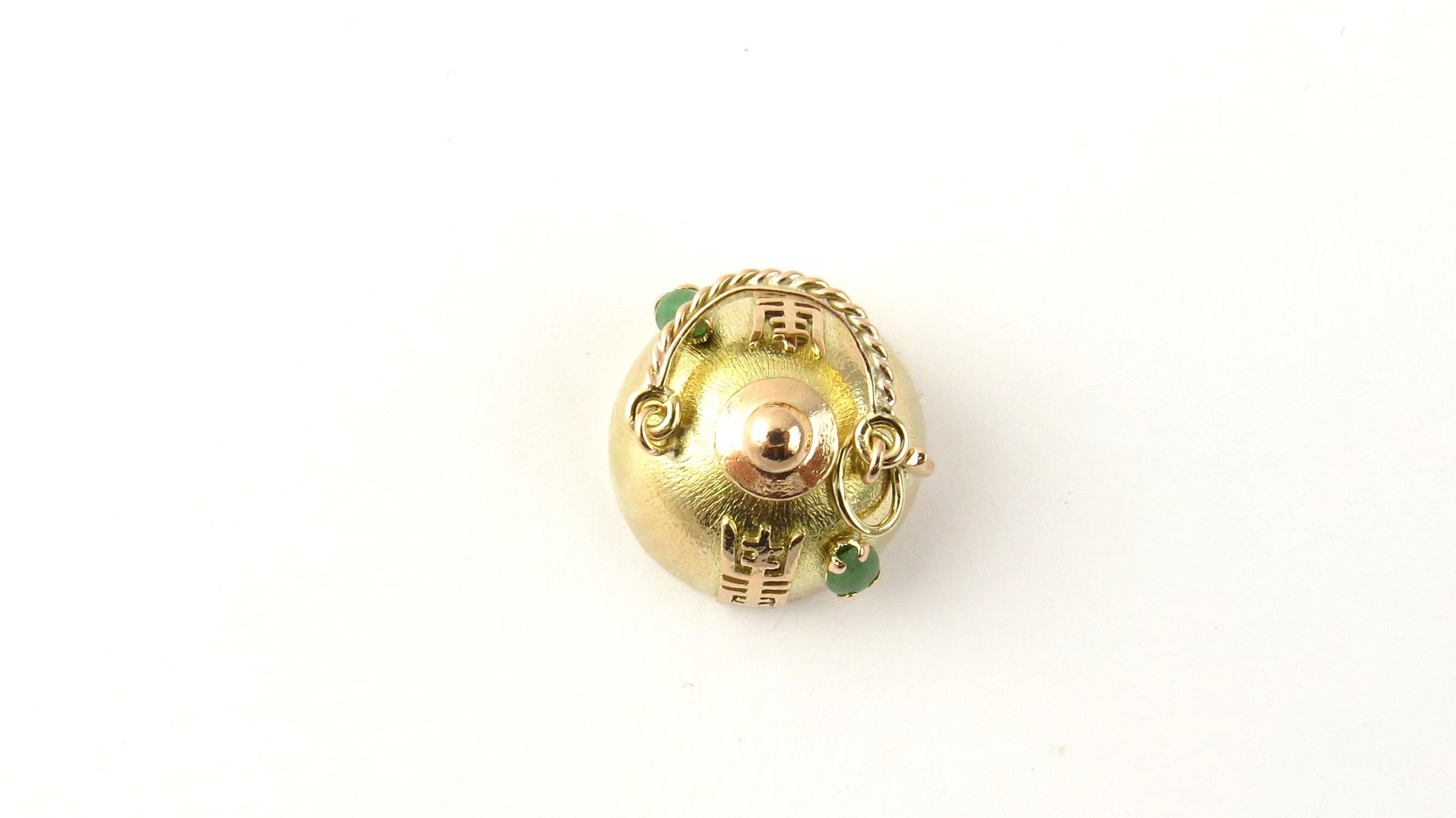Vintage 14 Karat Yellow Gold Teapot Charm

Tea time!

This lovely 3D charm features a miniature teapot decorated with Chinese characters and two jade stones beautifully detailed in 14K yellow gold.

Size: 18 mm x 19 mm

Weight: 4.6 dwt. / 7.3