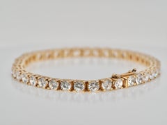 14 Karat Yellow Gold Tennis Bracelet with Round Cubic Zirconias