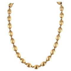 14 Karat Yellow Gold Textured Bead Necklace 16 Inches