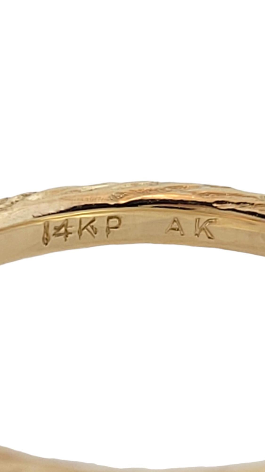 14 Karat Yellow Gold Textured Diamond Ring Size 5.25

This gorgeous 14K yellow gold ring features a stunning textured band with a sparkling, bezel set round brilliant cut diamond!

Approximate total diamond weight: .18 cts

Diamond color: I

Diamond