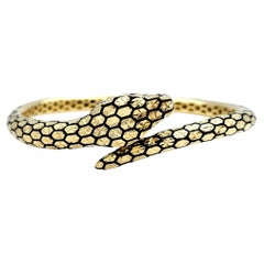 14 Karat Yellow Gold Textured Bypass Style Snake Hinged Bangle Bracelet