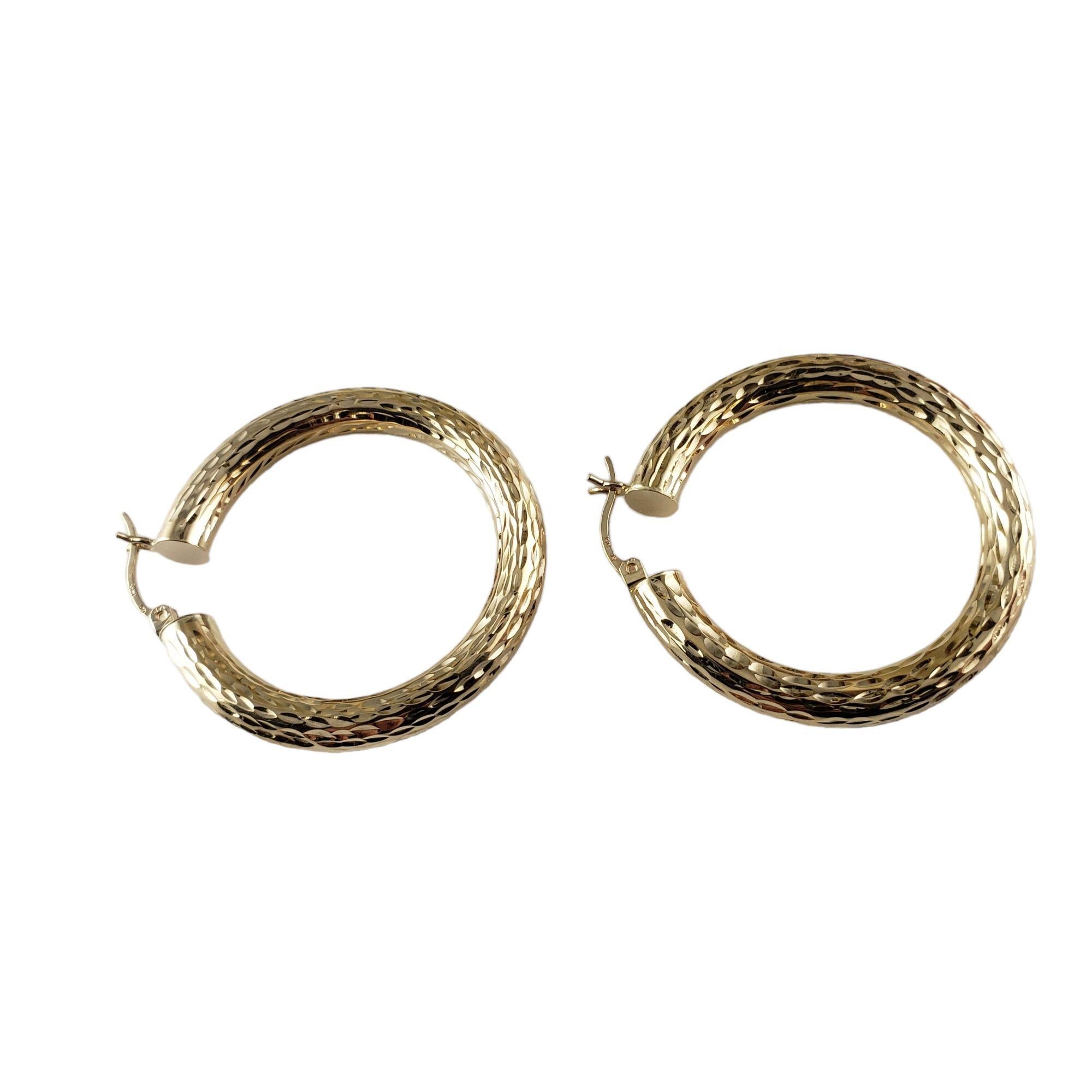 Women's 14 Karat Yellow Gold Textured Hoop Earrings #14154 For Sale