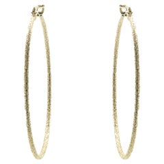 14 Karat Yellow Gold Textured Hoop Earrings