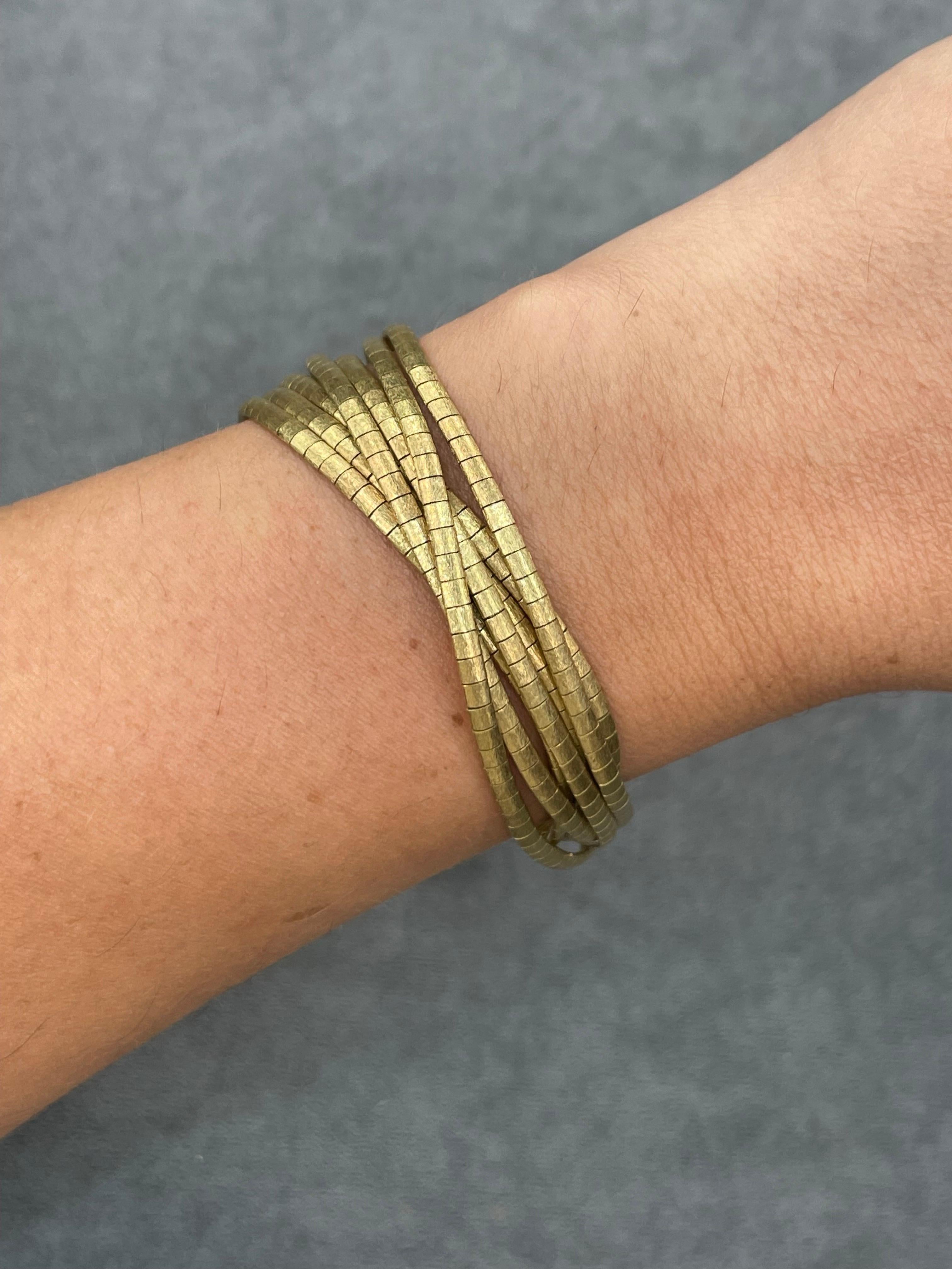 Women's 14 Karat Yellow Gold Textured 7 Row Multi Strand Bracelet 49.8 Grams For Sale