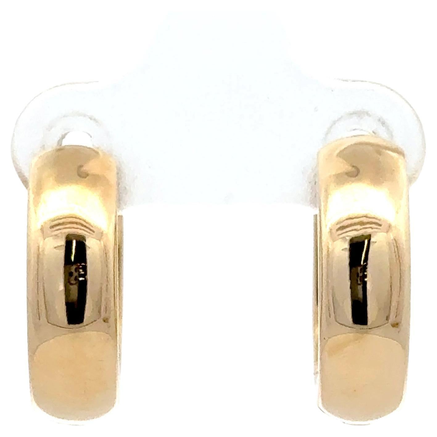 14 Karat yellow gold hoop earrings featuring 6 round brilliants weighing 0.64 carats, 5.33 grams.
Color G
Clarity VS2-SI1
Average Diamond 0.10 points.

More Diamond Hoops in Stock. 
Message for Pictures & Details. 