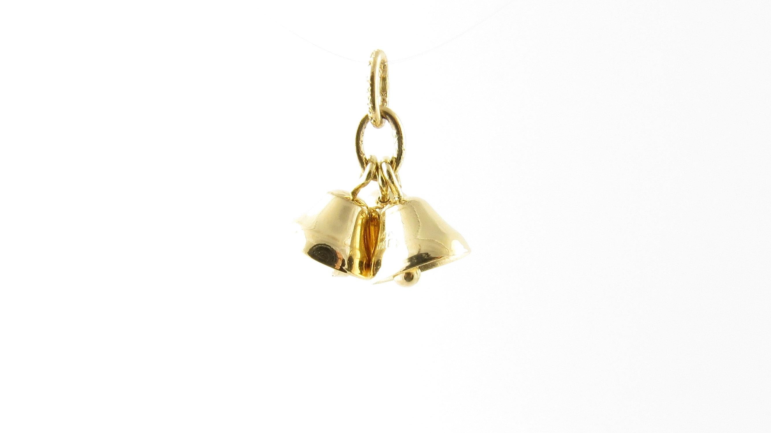 Vintage 14 Karat Yellow Gold Three Bells Charm- Jingle all the way! This lovely 3D charm features three bells with moving clapper beautifully detailed in 14K yellow gold. Size: 5 mm x 8 mm (each charm) Weight: 1.3 dwt. / 2.1 gr. Stamped: 14K