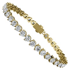 Bracelet tennis à trois griffes en or jaune 14 carats et diamants de 8 carats