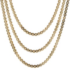 Collier tennis à trois rangées de diamants en or jaune 14 carats