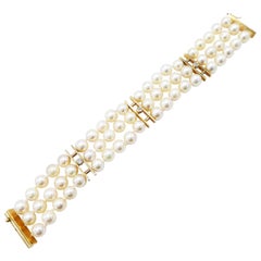 14 Karat Yellow Gold Three-Row Multi Strand Cultured Pearl and Diamond Bracelet