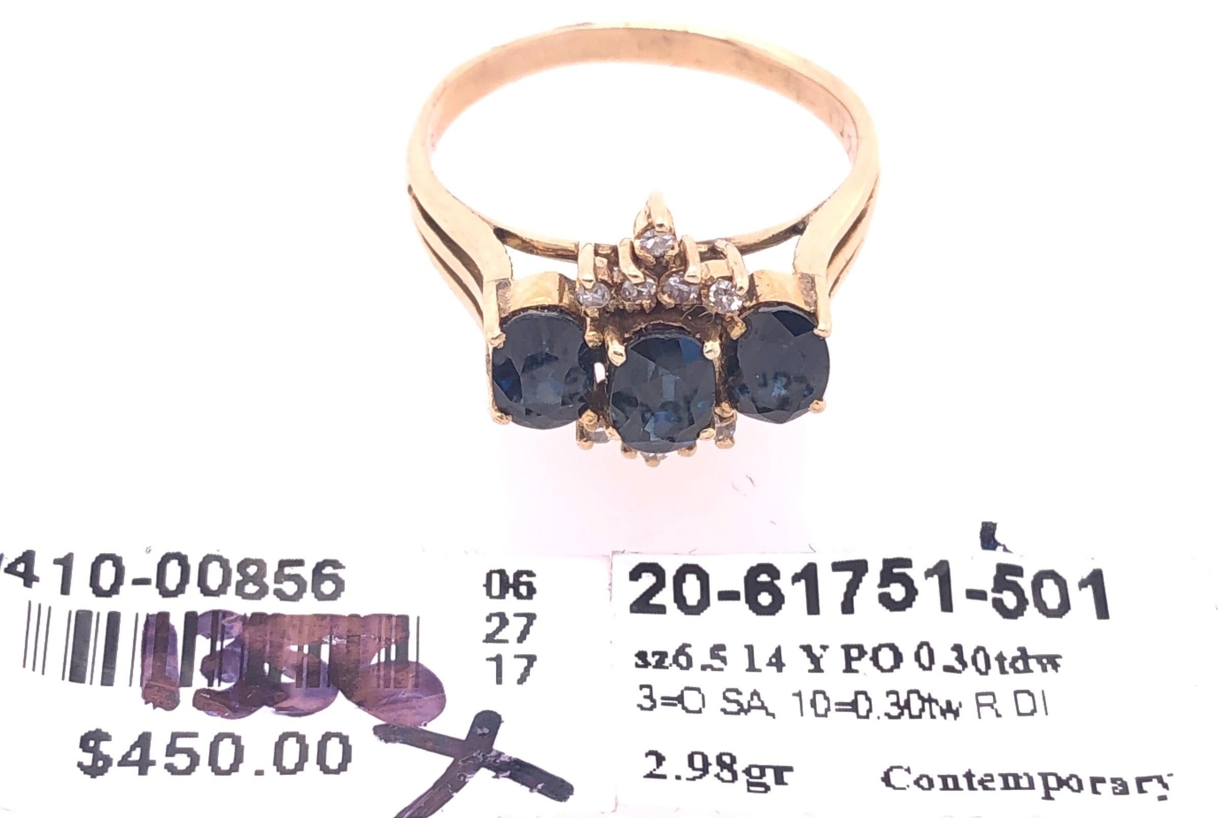 14 Karat Yellow Gold Three-Stone Sapphire Ring with Diamond Accents In Good Condition In Stamford, CT