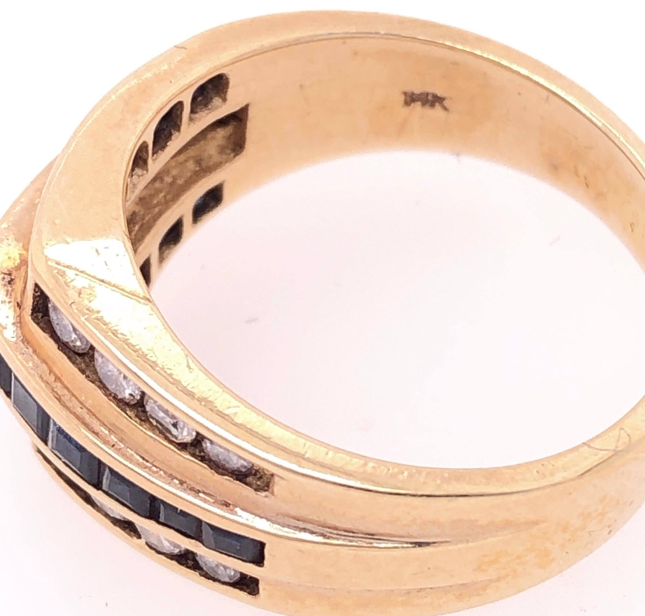 14 Karat Yellow Gold Three-Tier Ring with Sapphires and Diamonds In Good Condition For Sale In Manhasset, NY