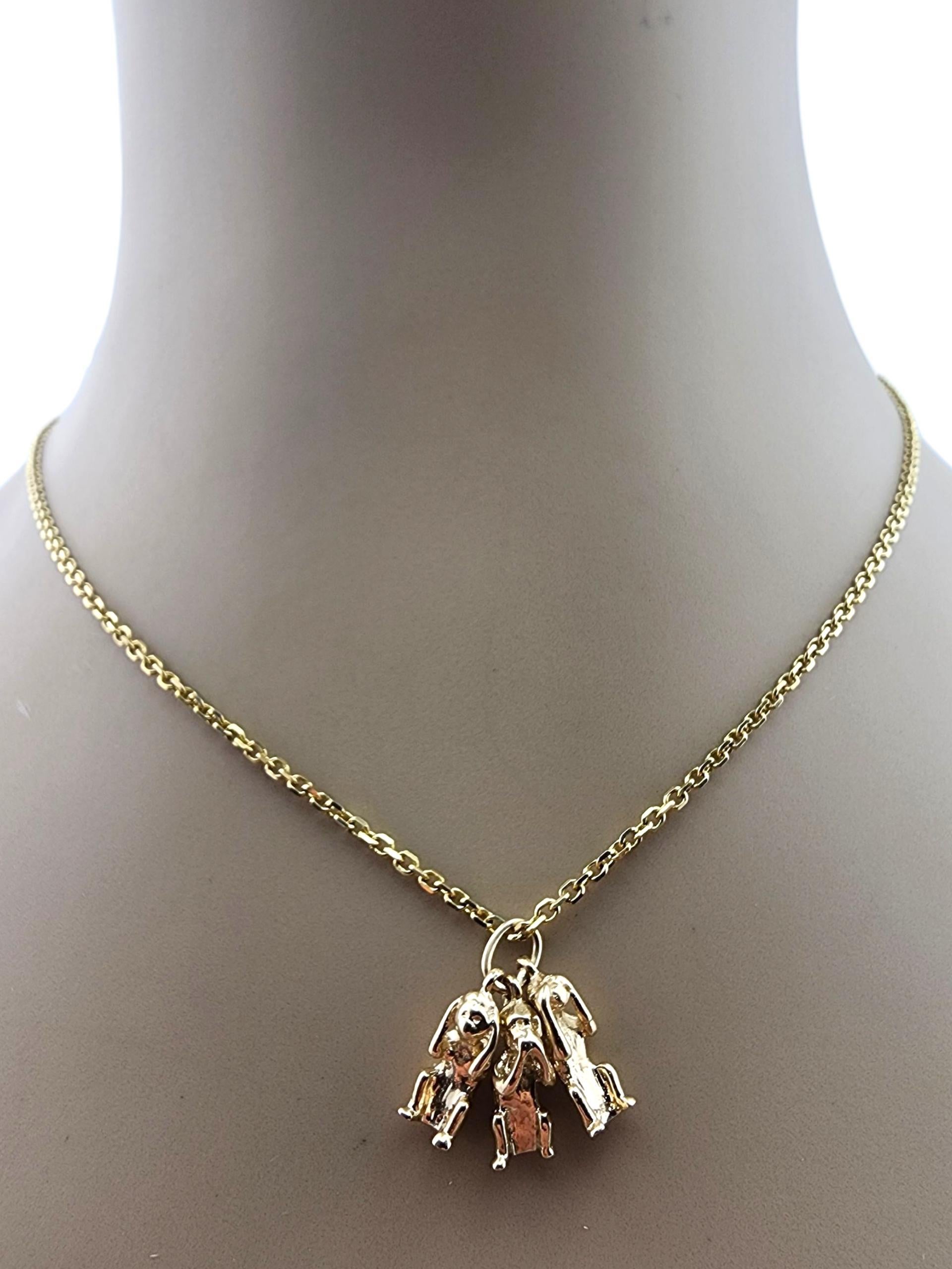 Charm in oro giallo 14 carati con tre scimmie sagge 