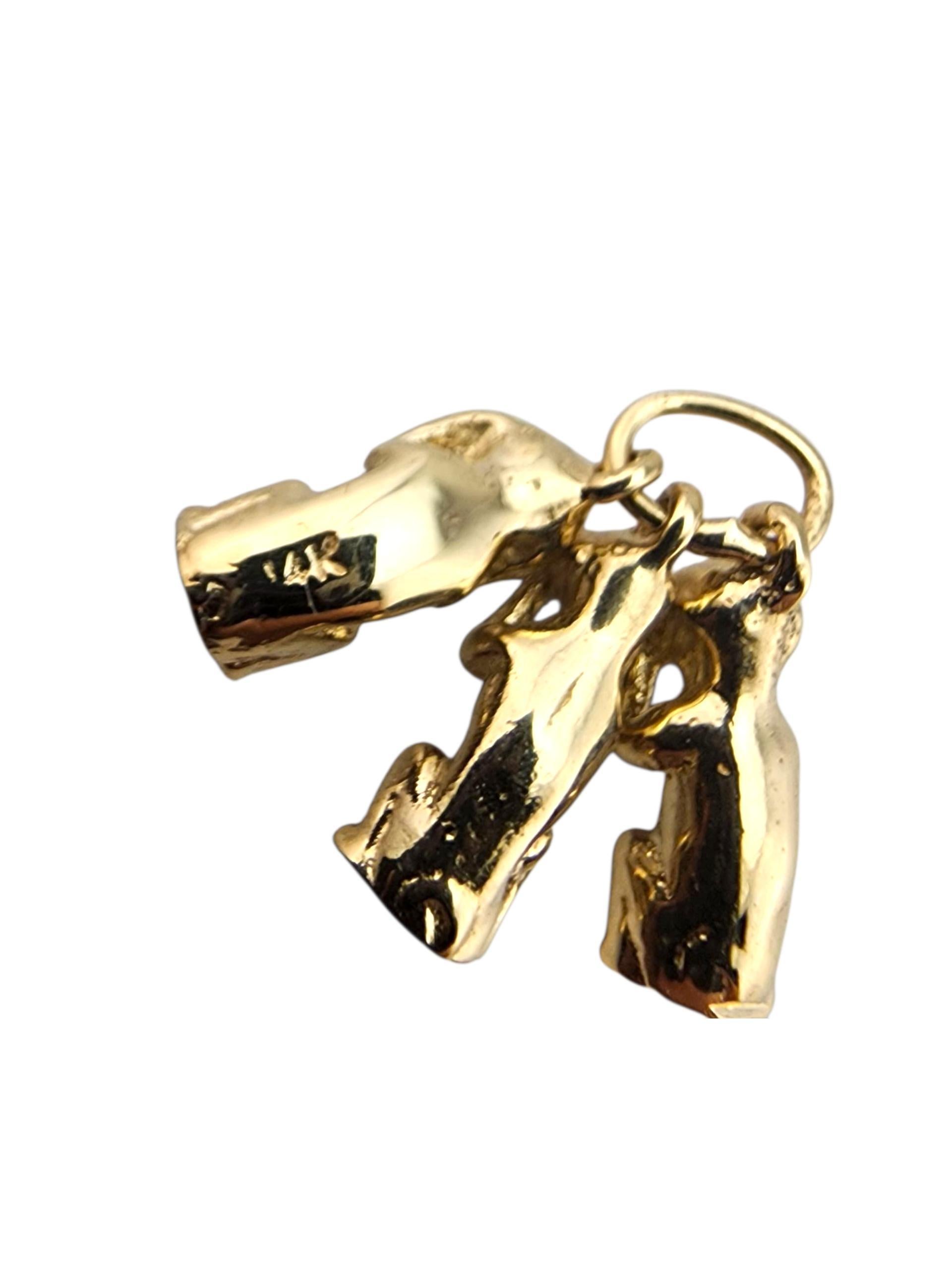 Charm in oro giallo 14 carati con tre scimmie sagge 