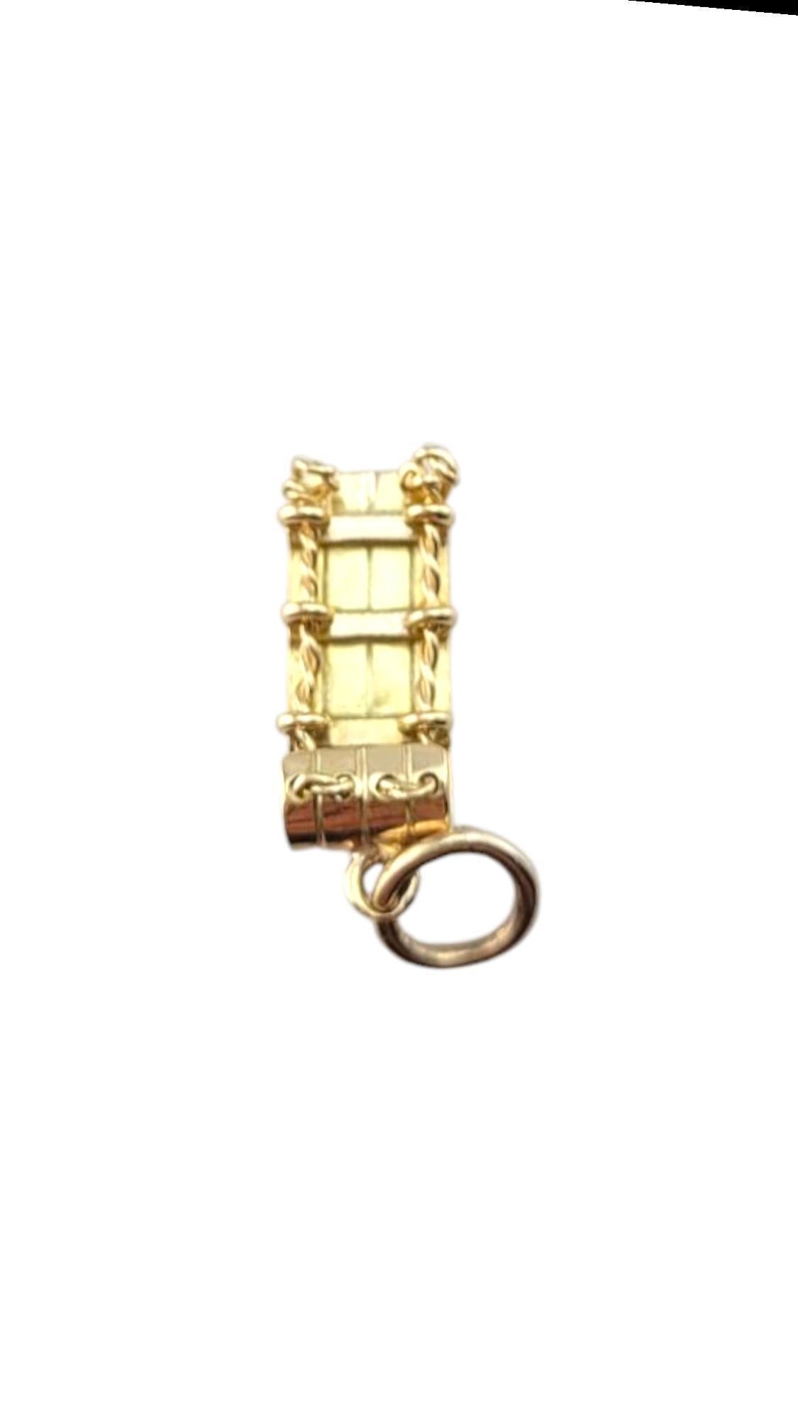 Charm a slitta in oro giallo 14 carati #21264 in vendita
