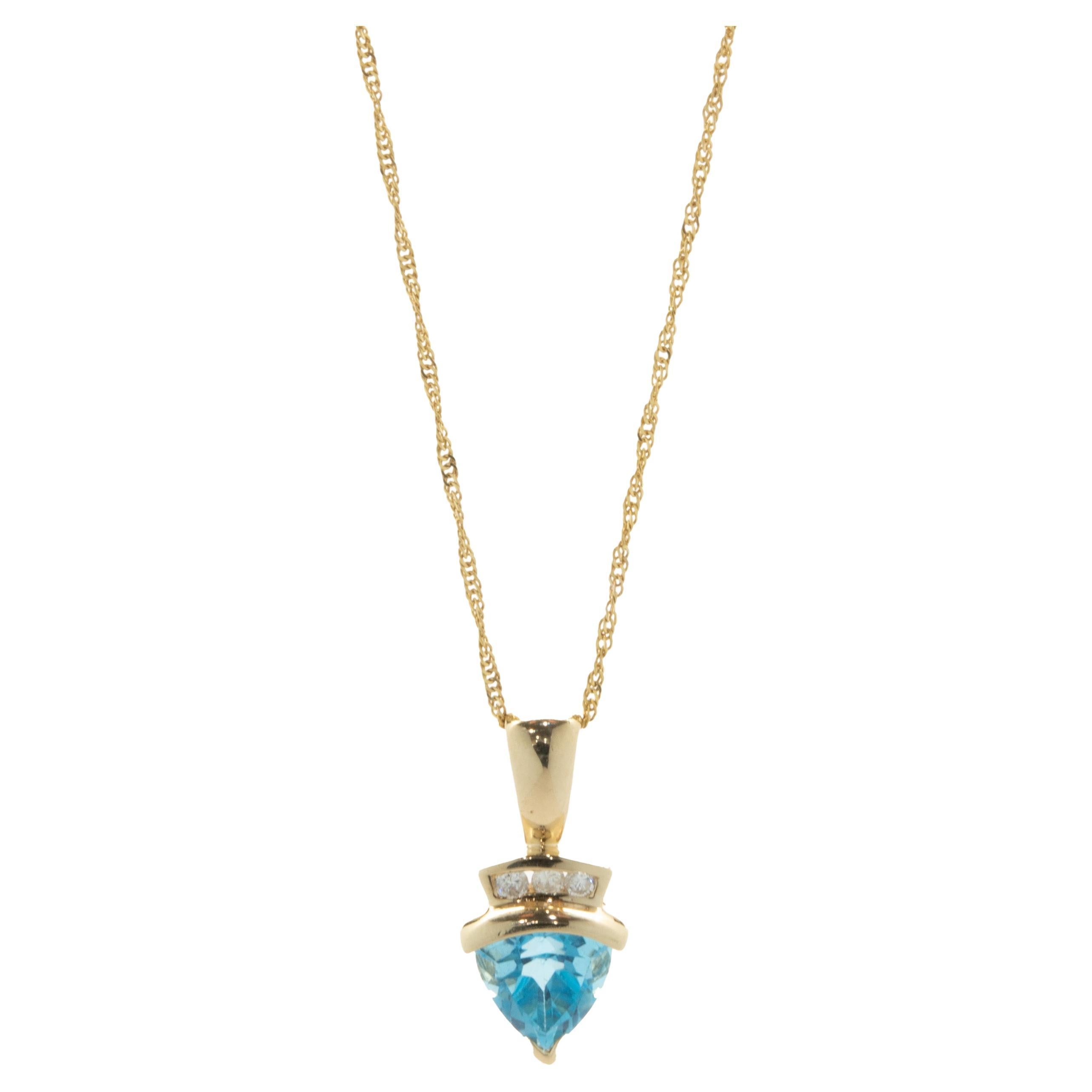 14 Karat Yellow Gold Trillion Cut Blue Topaz and Diamond Necklace For Sale