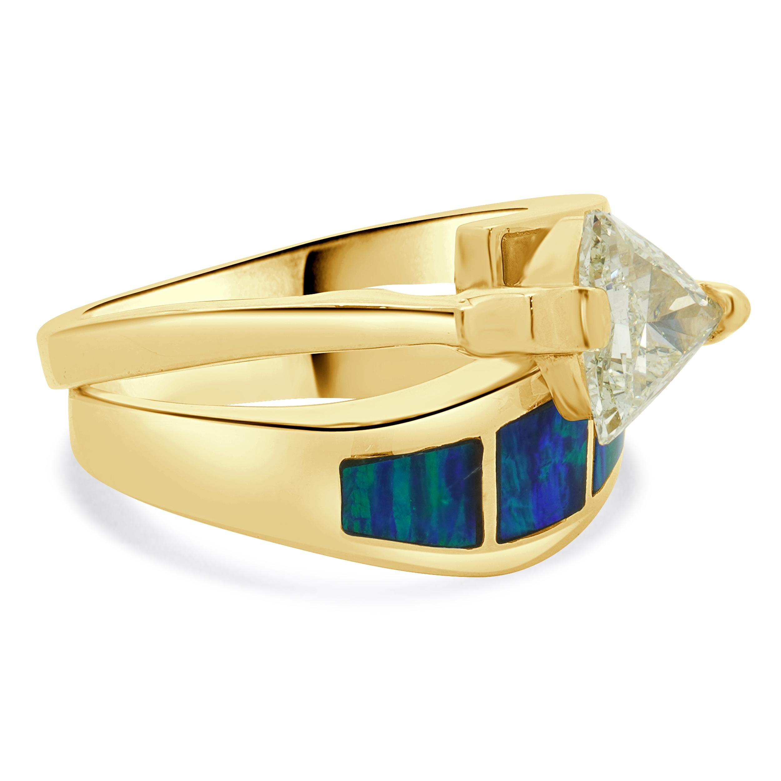 Designer: custom
Material: 14K yellow gold
Diamond: trillion cut = 0.78cttw
Color: O
Clarity: SI1
Ring Size: 7.75 (please allow two additional shipping days for sizing requests)
Dimensions: ring top measures 13.4mm
Weight: 11.62 grams