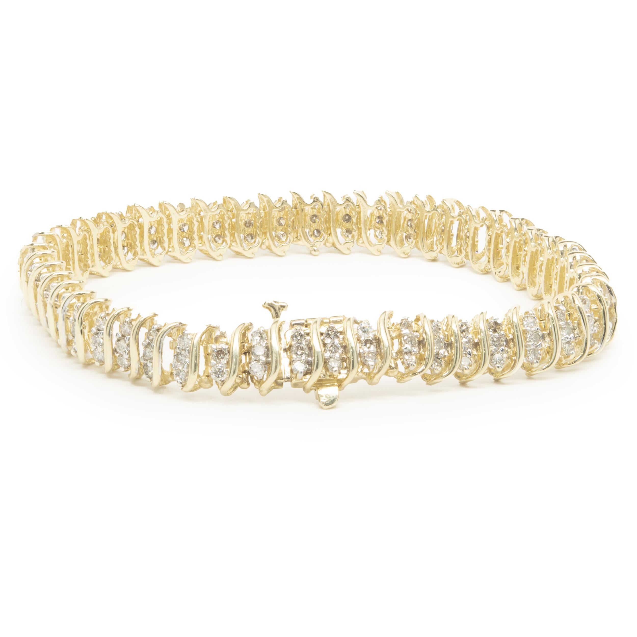 Designer: custom
Material: 14K yellow gold
Diamonds: 144 round brilliant cut = 4.30cttw
Color: H
Clarity: SI1-2
Dimensions: bracelet will fit up to a 7-inch wrist
Weight: 14.40 grams