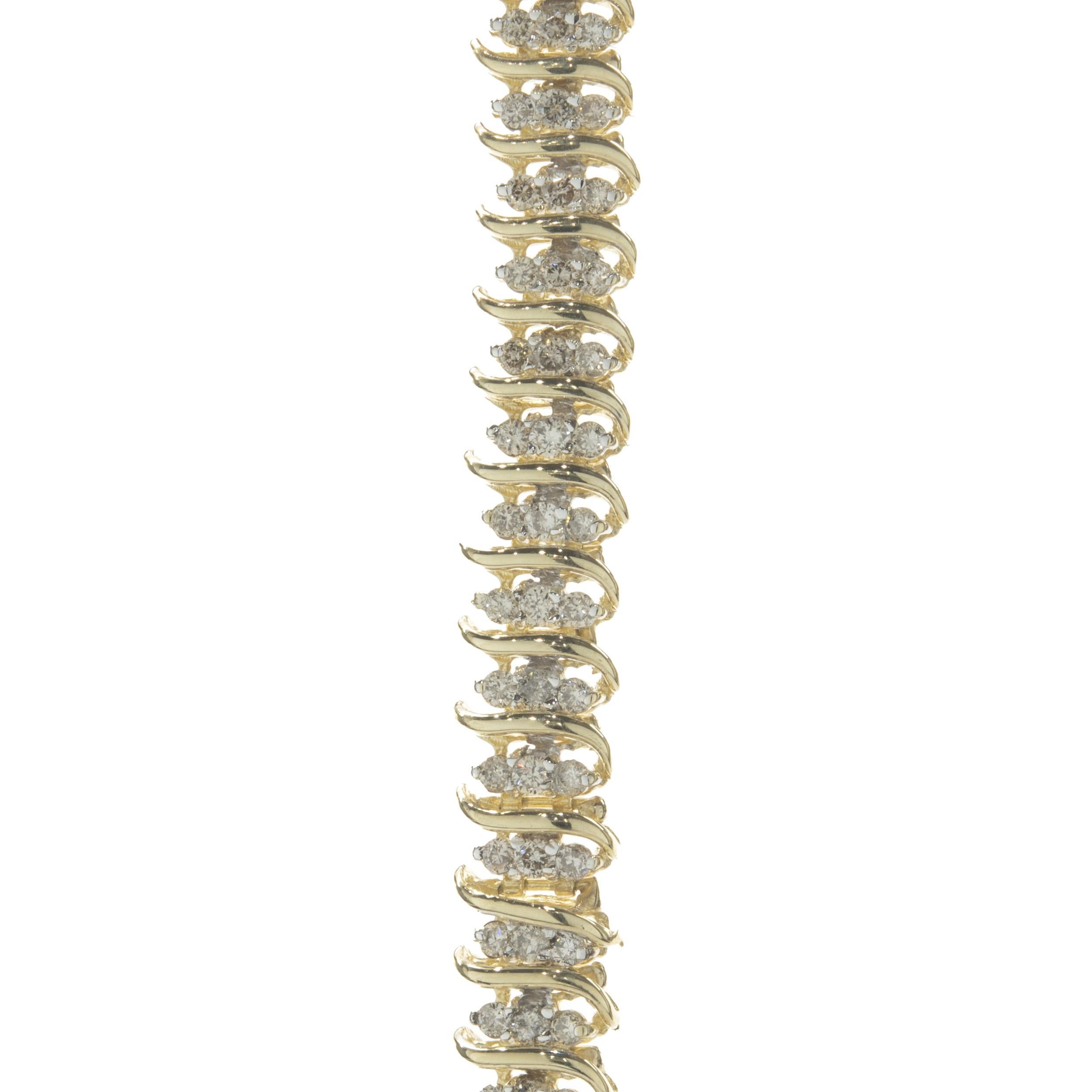 14 Karat Yellow Gold Triple Row Diamond S Link Bracelet In Excellent Condition For Sale In Scottsdale, AZ