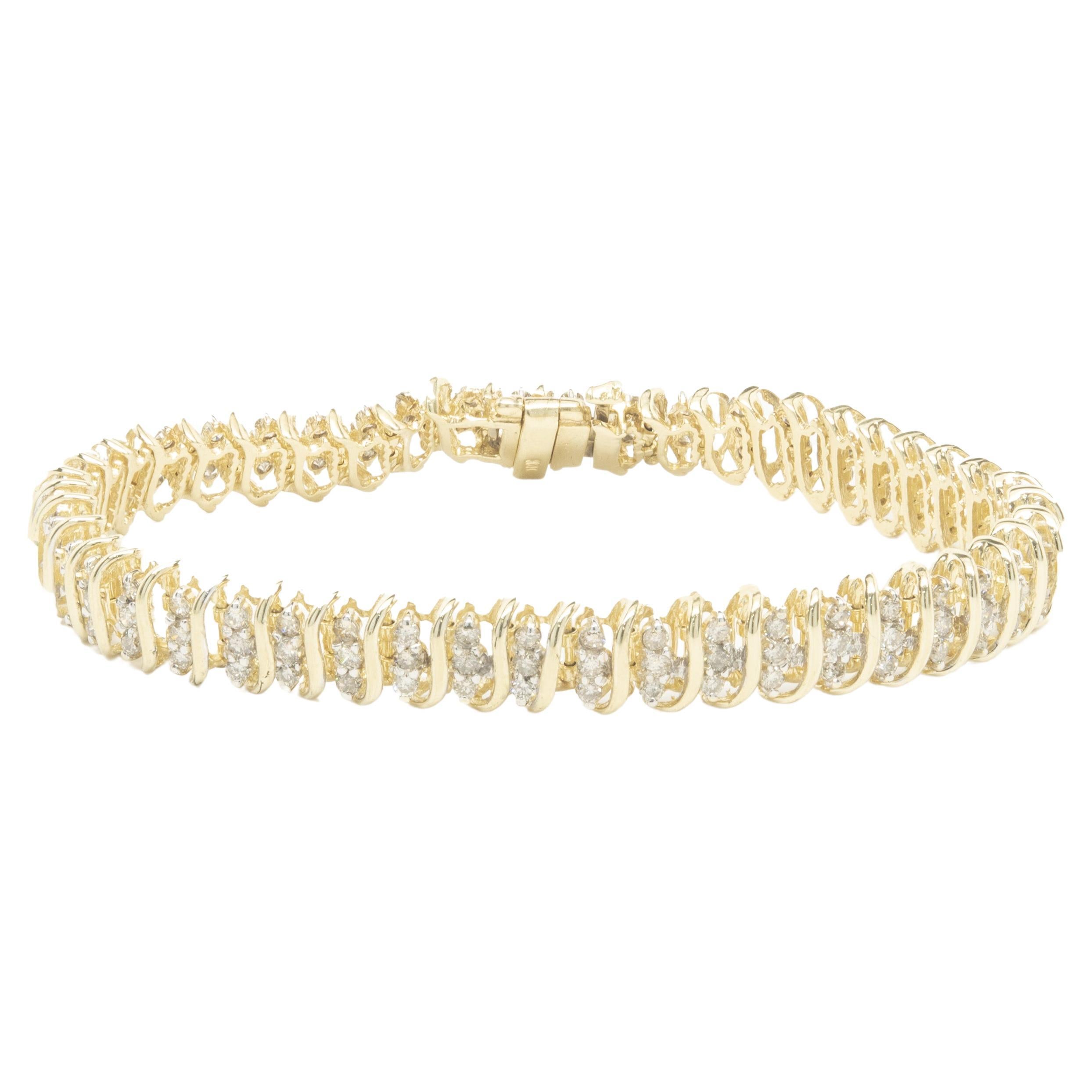 14 Karat Yellow Gold Triple Row Diamond S Link Bracelet