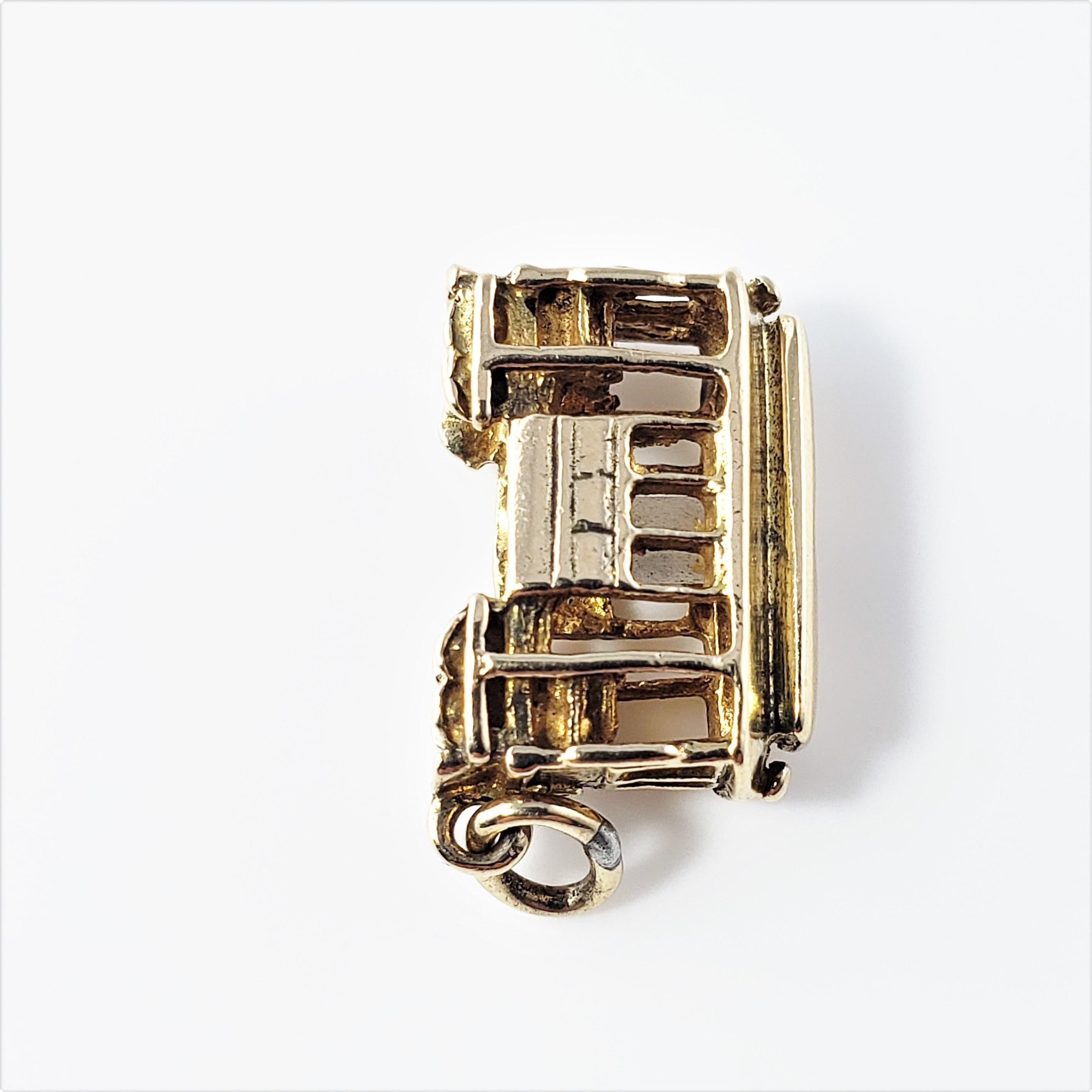 14 Karat Yellow Gold Trolley Car Charm-

Take a ride on the trolley car!

This lovely 3D charm features a miniature cable car meticulously detailed in 14K yellow gold.

*Image no longer visible through Stanhope.

Size:  16 mm  x  10 mm (actual