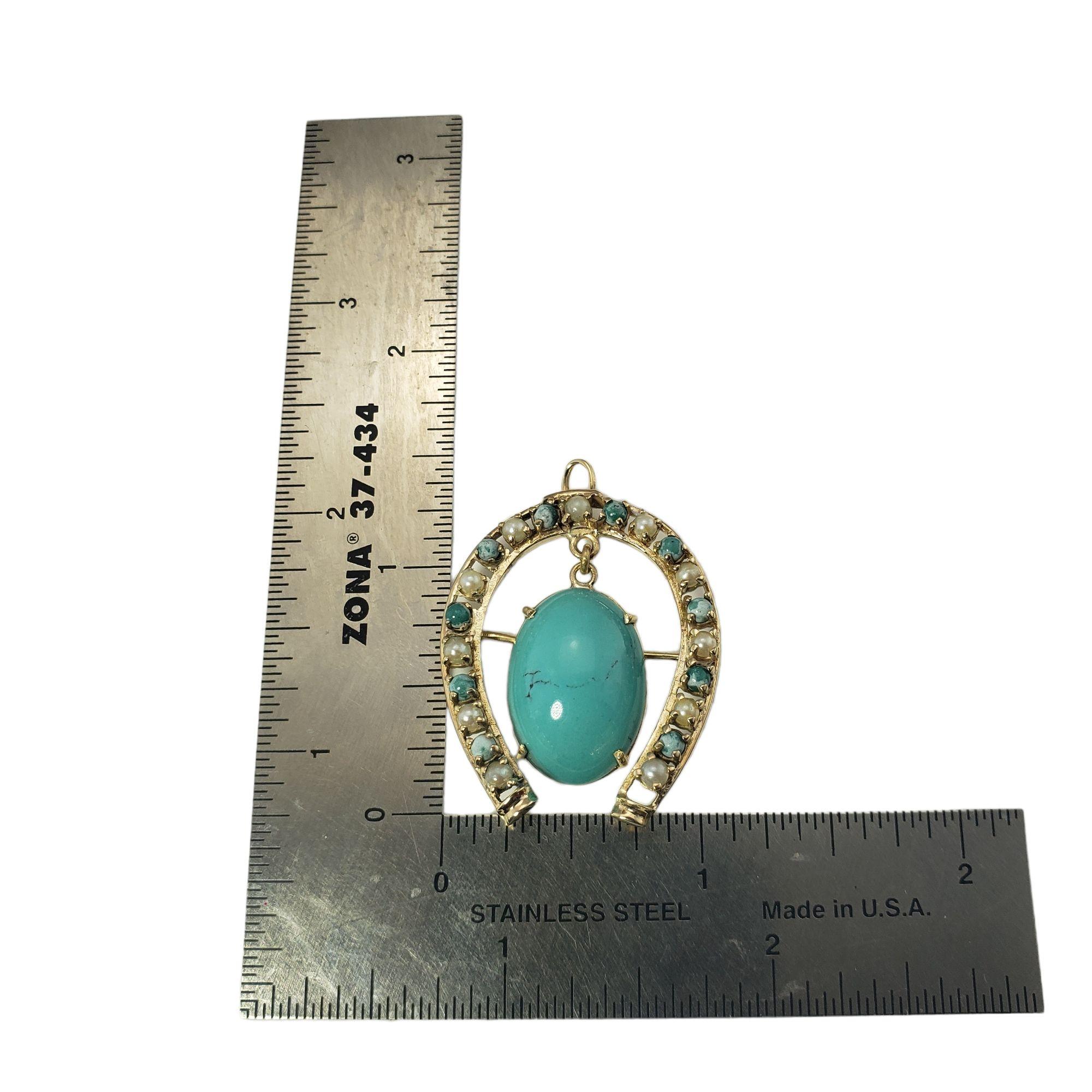 Vintage 14 Karat Yellow Gold Turquoise and Pearl Horseshoe Brooch/Pin-

This elegant brooch features one oval turquoise stone (20 mm x 15 mm), 11 round turquoise stones and 11 round pearls set in classic 14K yellow gold. Can be worn as a pin or a