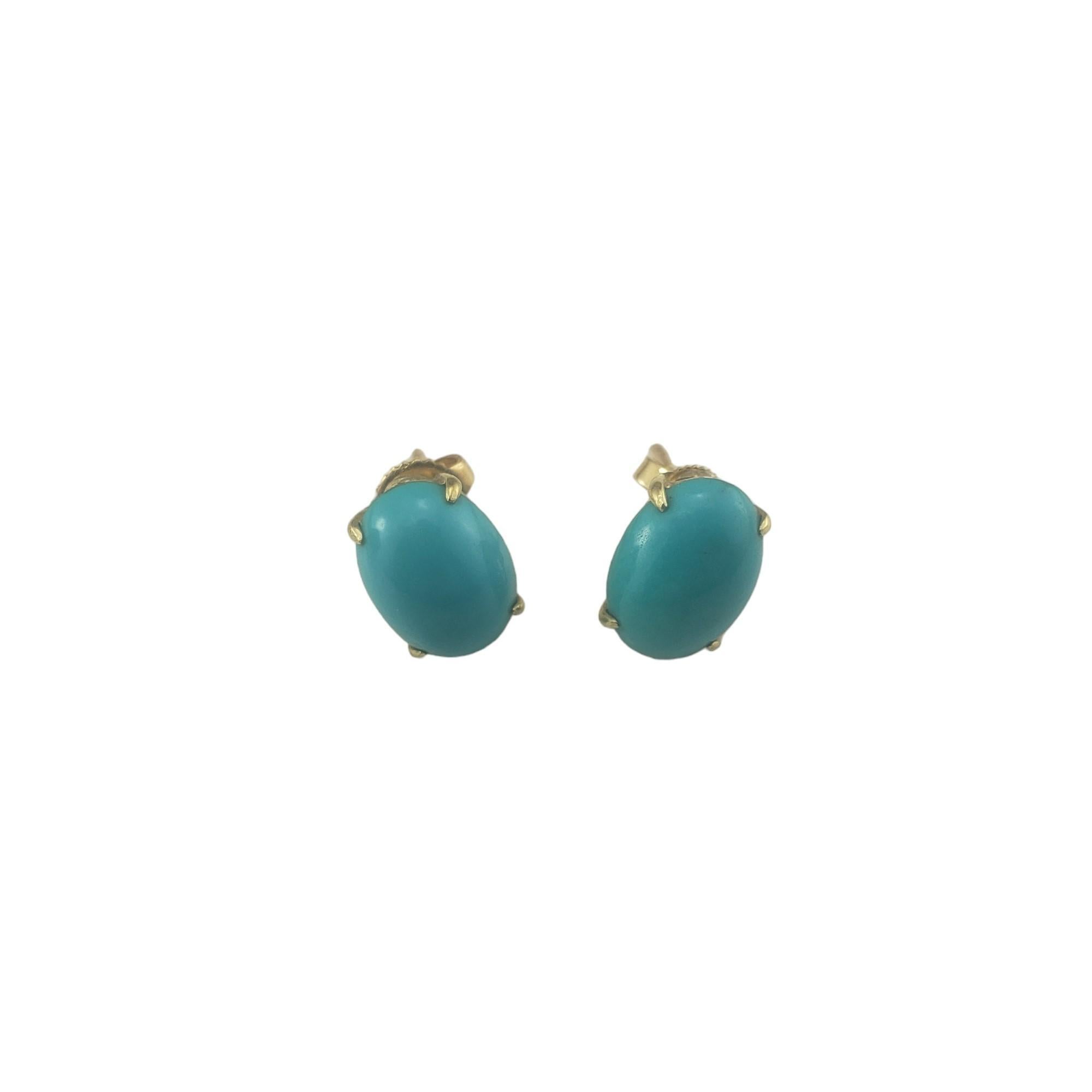Vintage 14K Yellow Gold Turquoise Stud Earrings-

These elegant earrings each feature one turquoise stone (11 mm x 8 mm) set in classic 14K yellow gold.  Push back closures.

Size: 11 mm x 8 mm

Tested 14K gold.

Weight: 1.8 dwt./ 3.0 gr.

Very good
