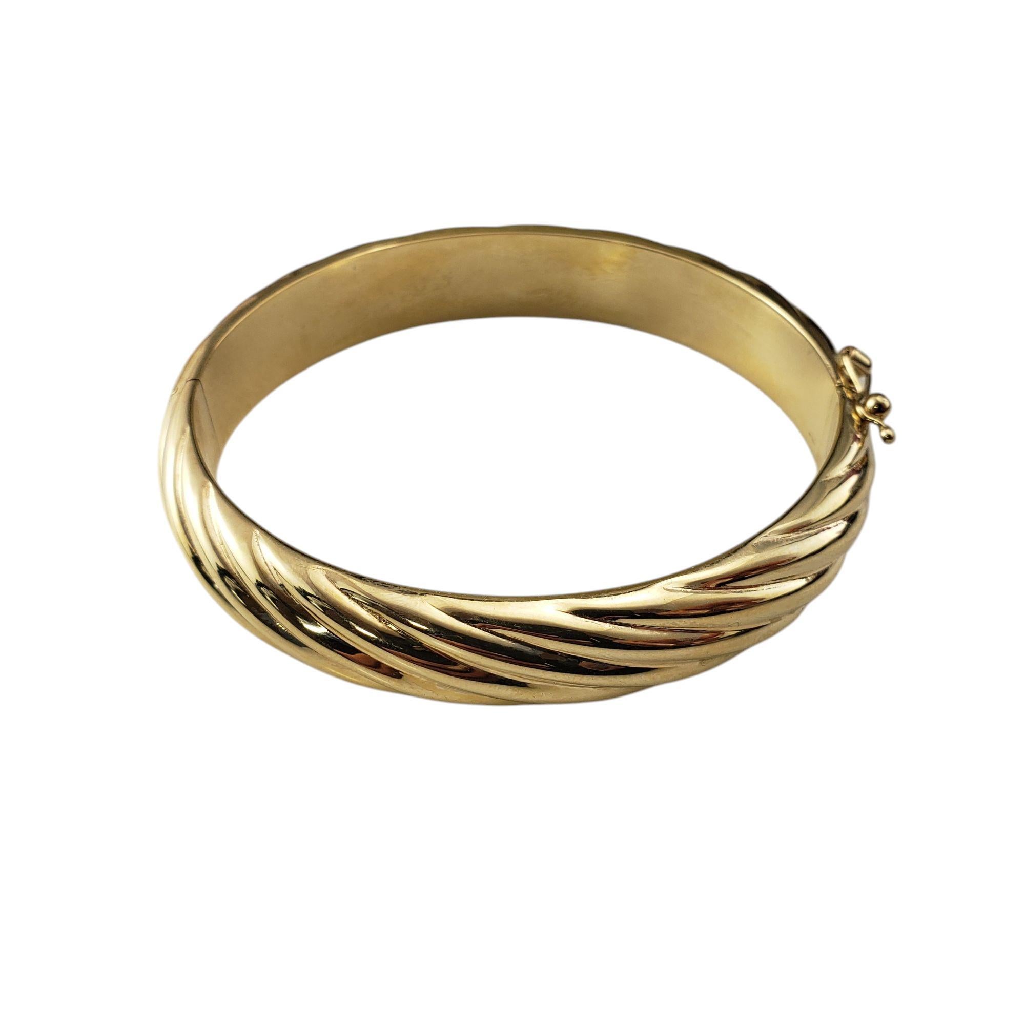 14 Karat Yellow Gold Twist Bangle Bracelet #20877