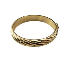 14 Karat Yellow Gold Twist Bangle Bracelet #20877