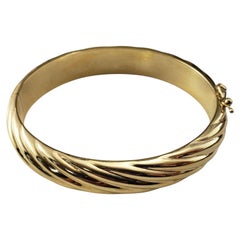 14 Karat Yellow Gold Twist Bangle Bracelet #21770
