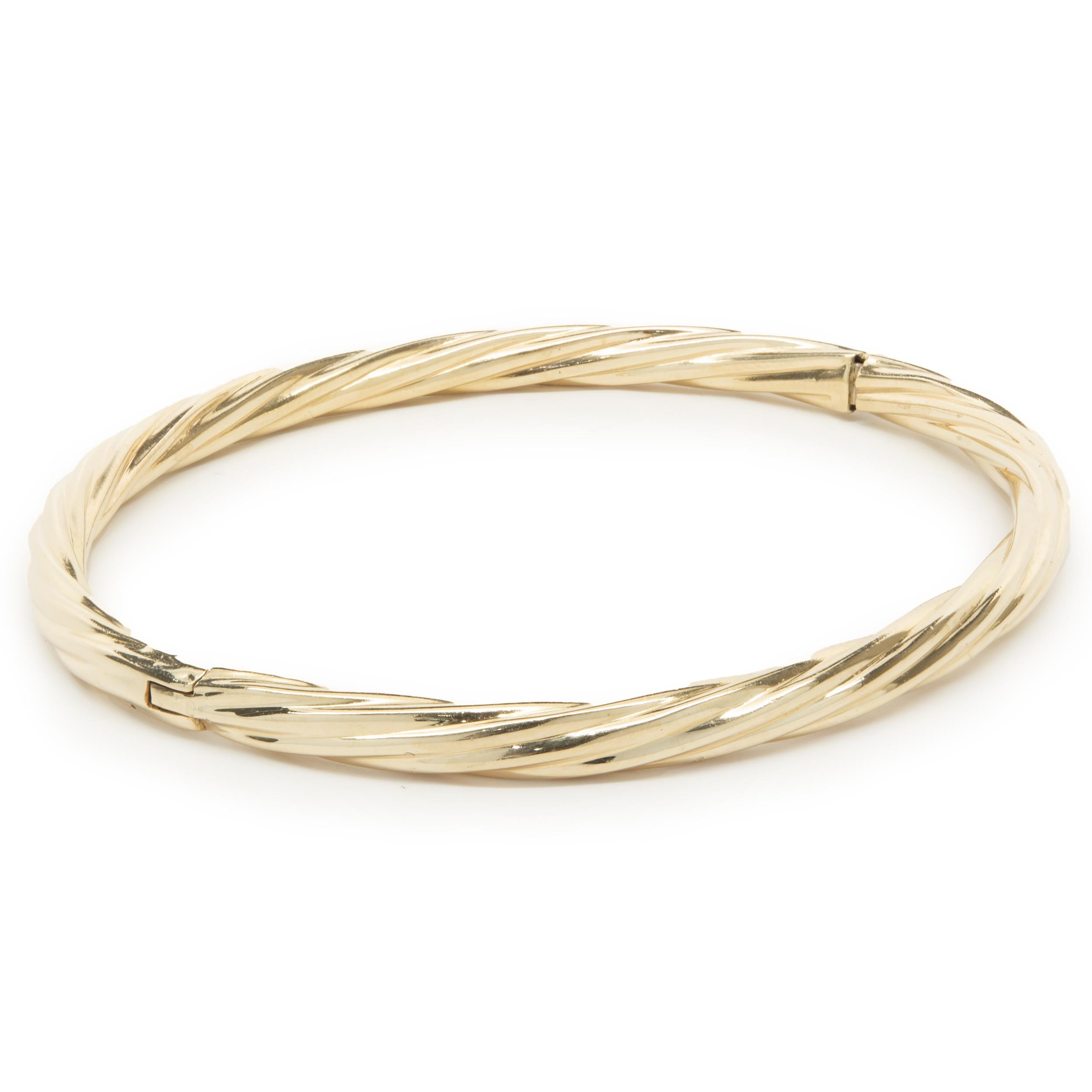 Material: 14K yellow gold
Dimensions: bracelet will fit up to a 7-inch wrist
Weight: 11.22 grams