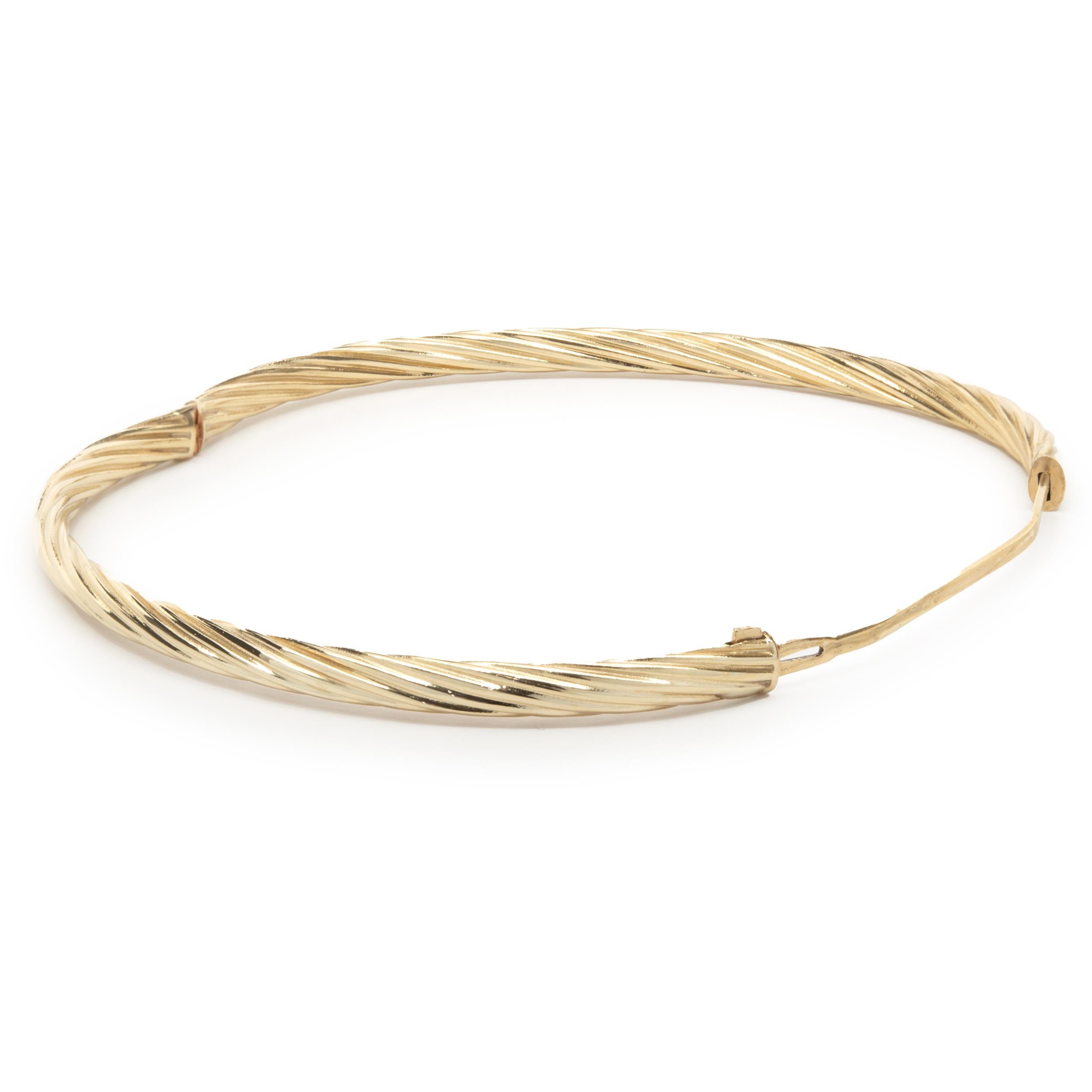 Material: 14K yellow gold
Dimensions: bracelet will fit up to an 7-inch wrist
Weight: 5.09 grams
