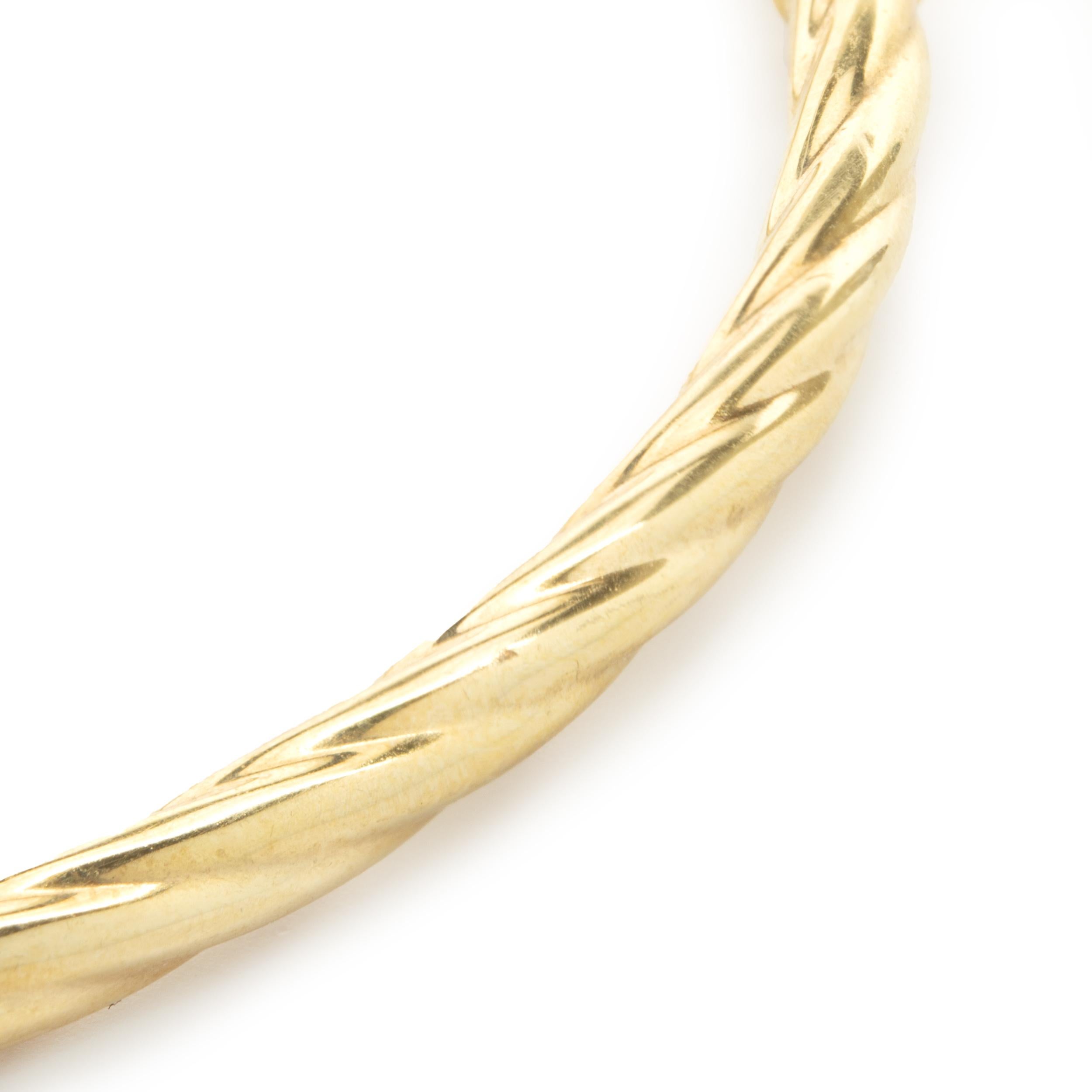 Material: 14K yellow gold
Dimensions: bracelet will fit up to an 7-inch wrist
Weight: 2.12 grams
