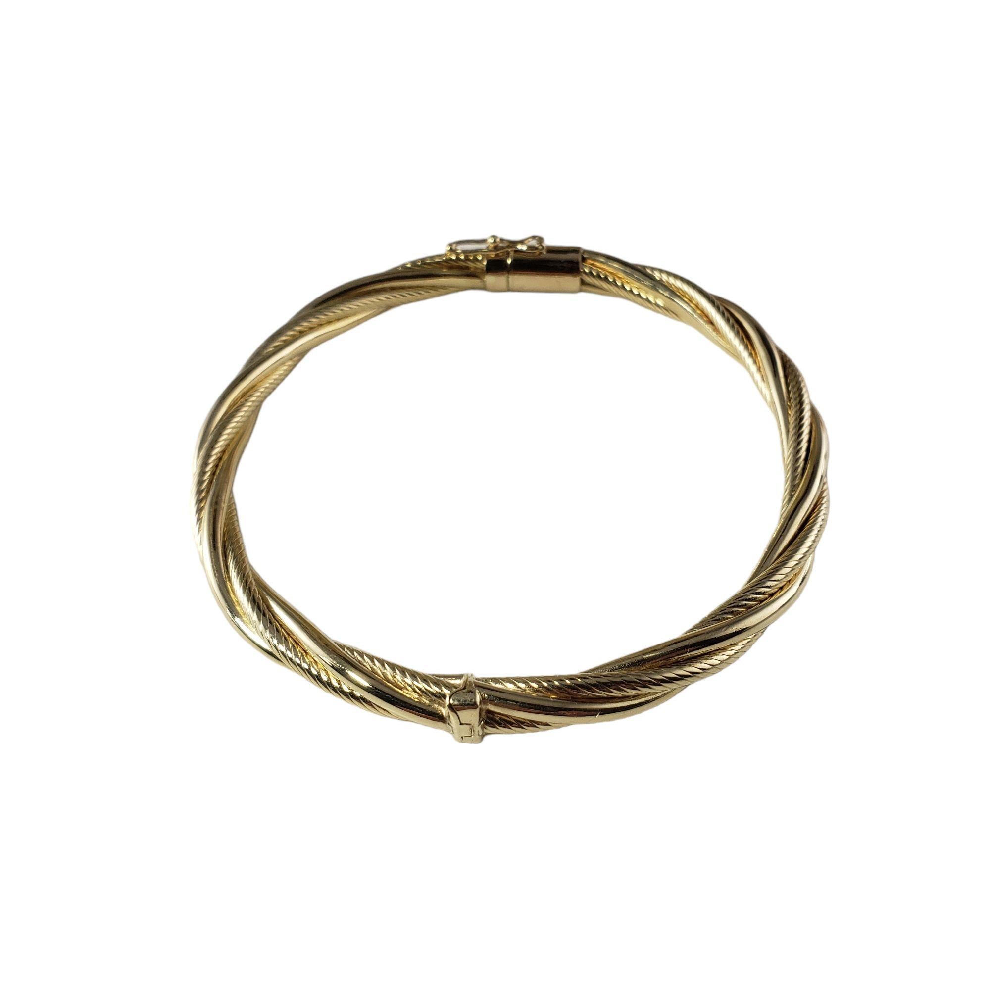14 Karat Yellow Gold Twist Bangle Bracelet For Sale 1