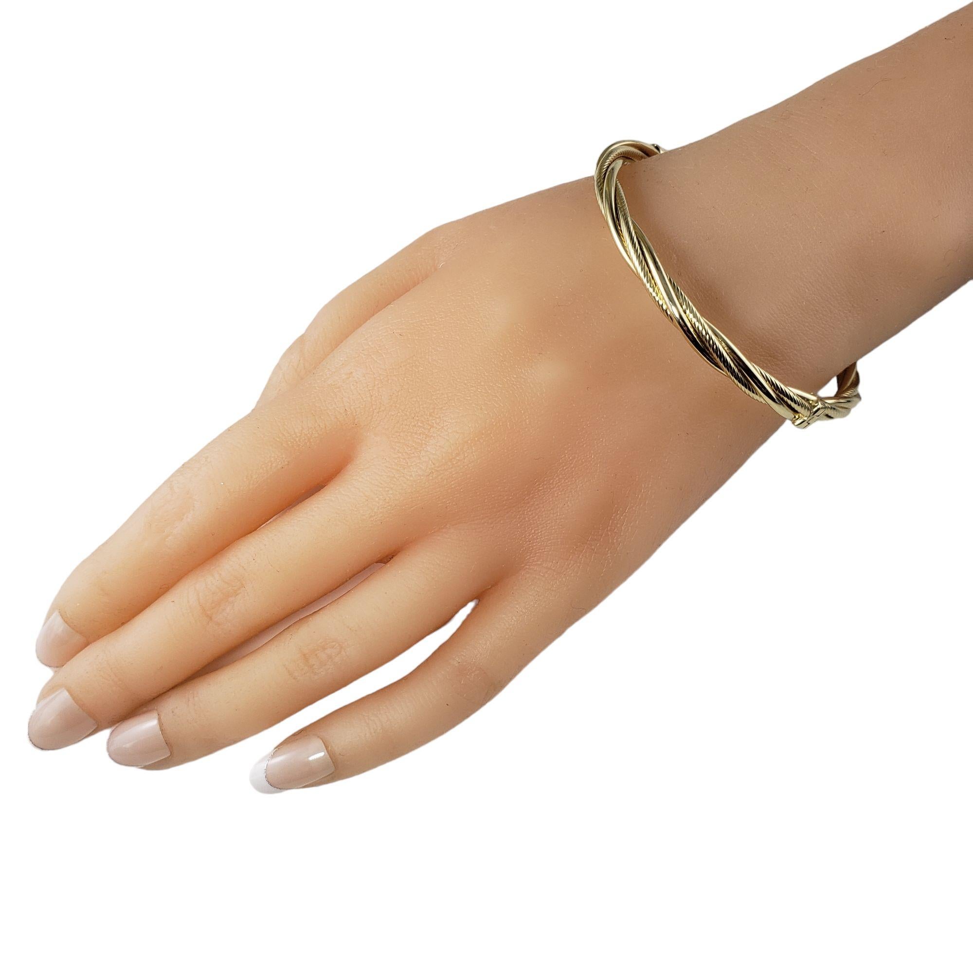 Armreif aus 14 Karat Gelbgold mit gedrehtem Armband im Angebot 3