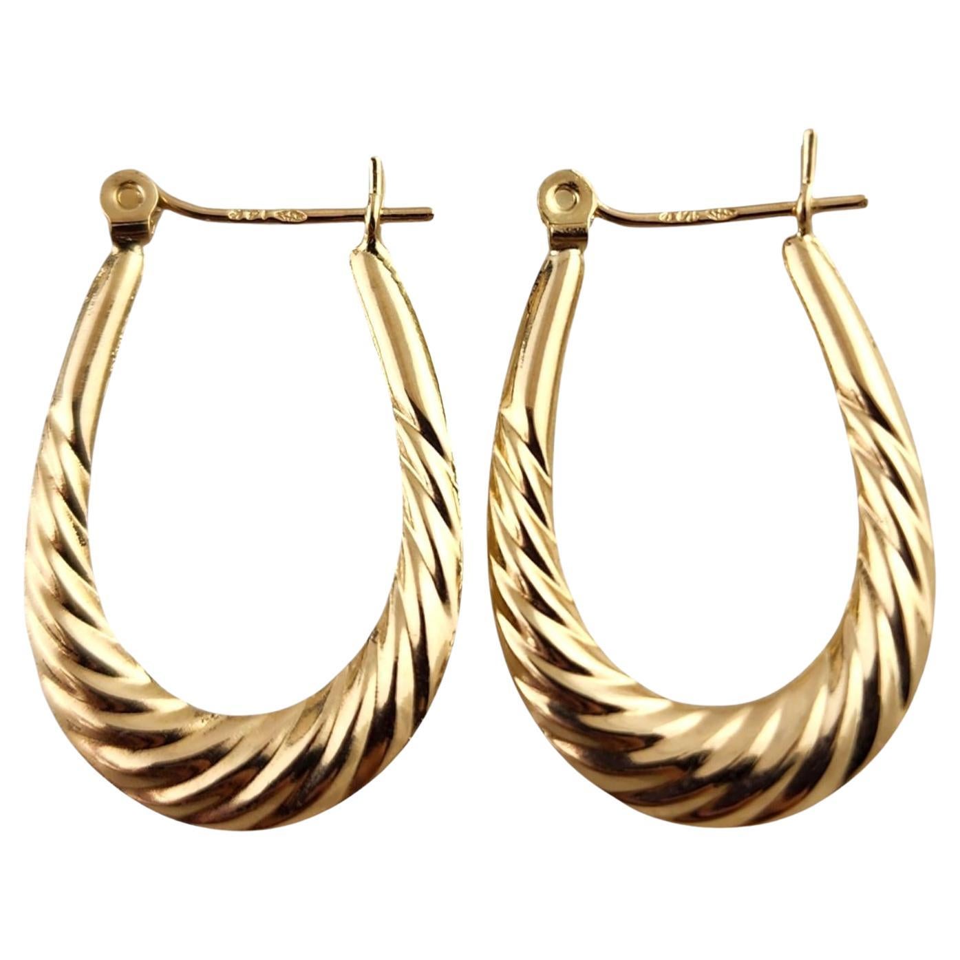 14 Karat Yellow Gold Twist Cable Oval Hoop Earrings #18782