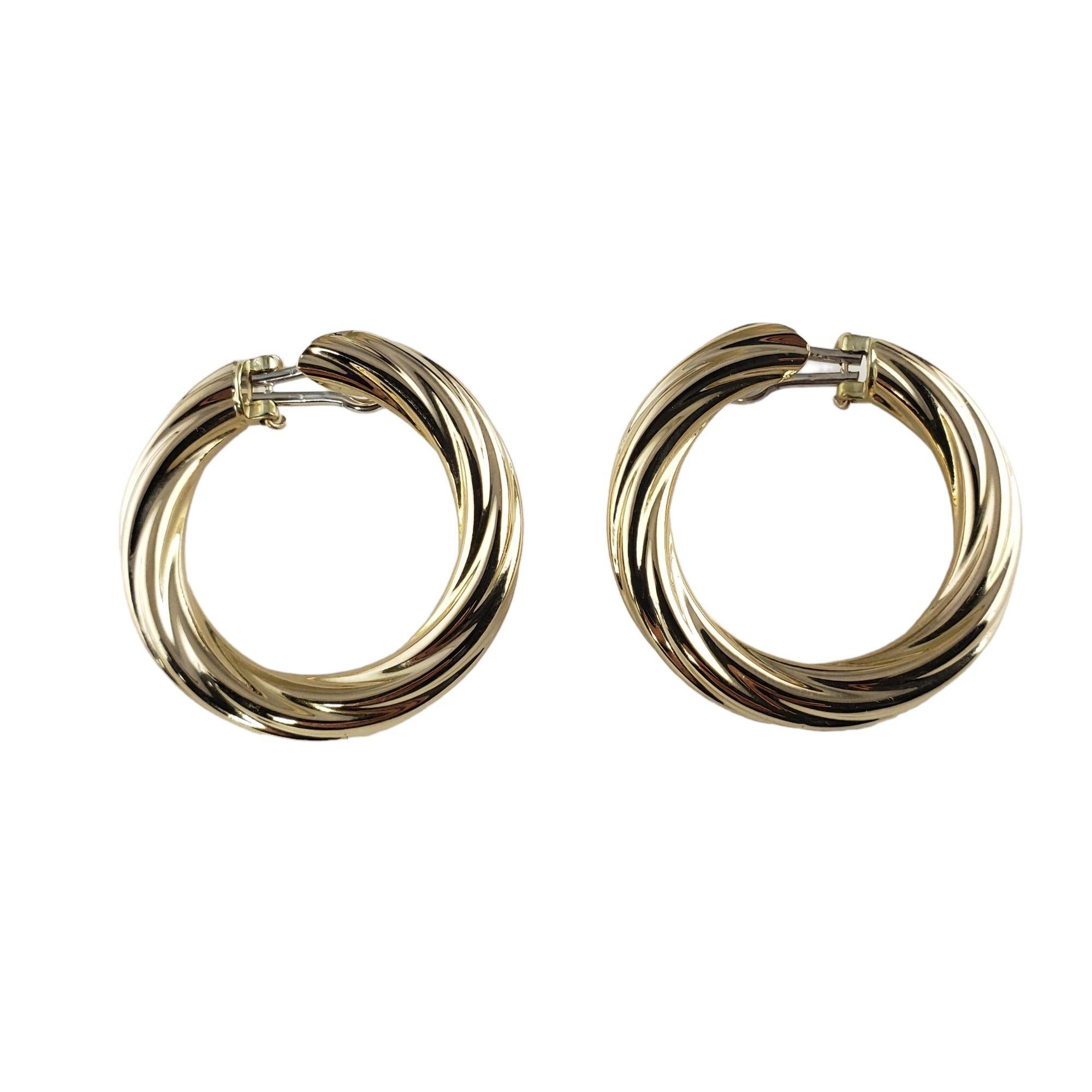 Women's 14 Karat Yellow Gold Twist Hoop Earrings For Sale