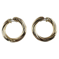 14 Karat Yellow Gold Twist Hoop Earrings