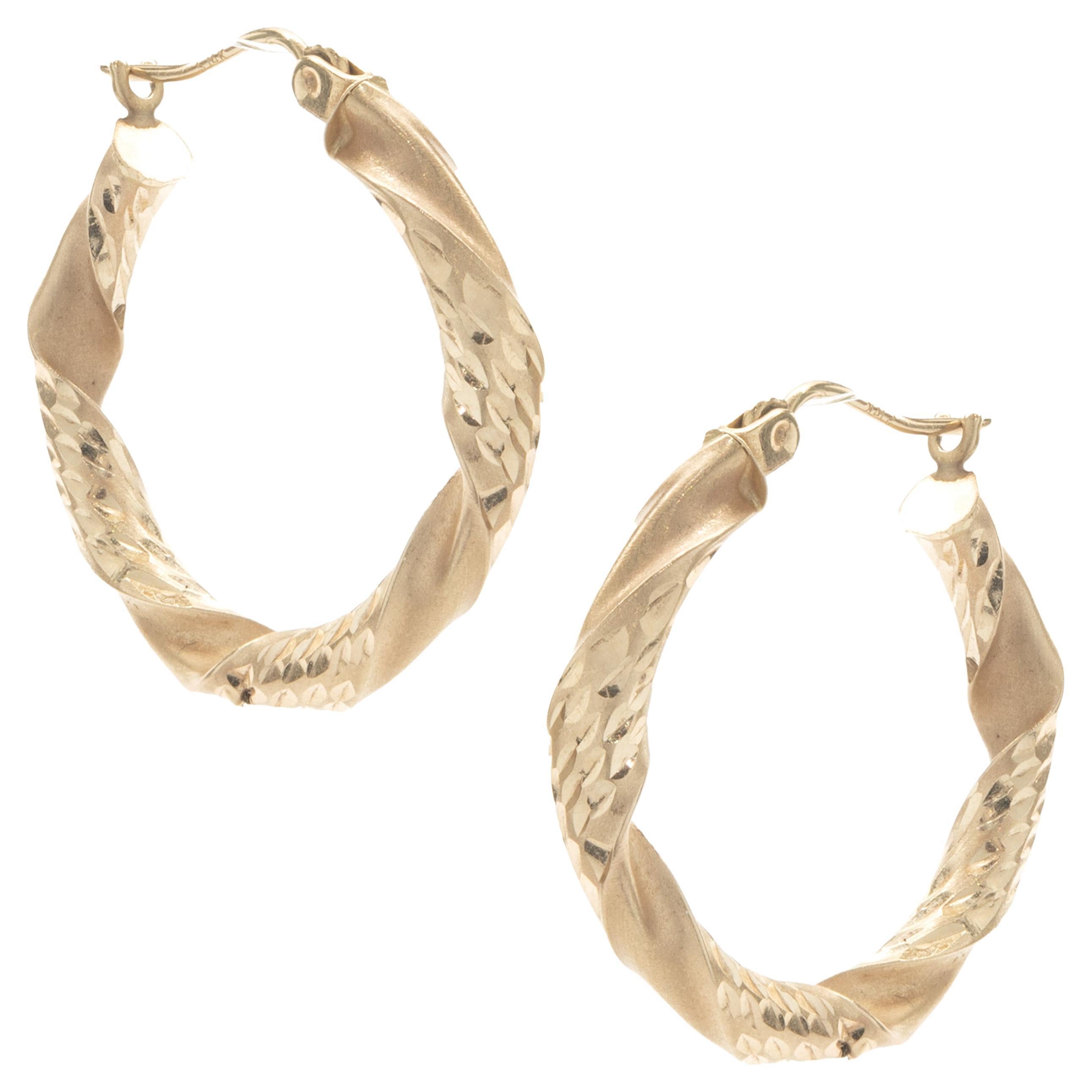 14 Karat Yellow Gold Twist Hoop Earrings For Sale