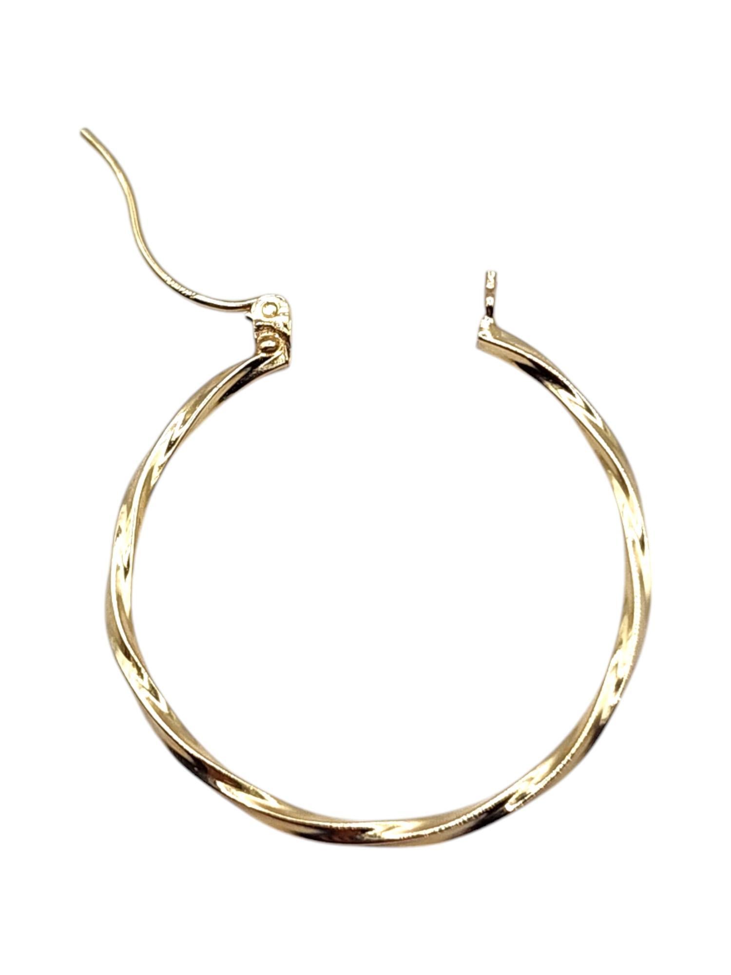 Women's 14 Karat Yellow Gold Twisted Circle Hoop Earrings #20463 For Sale