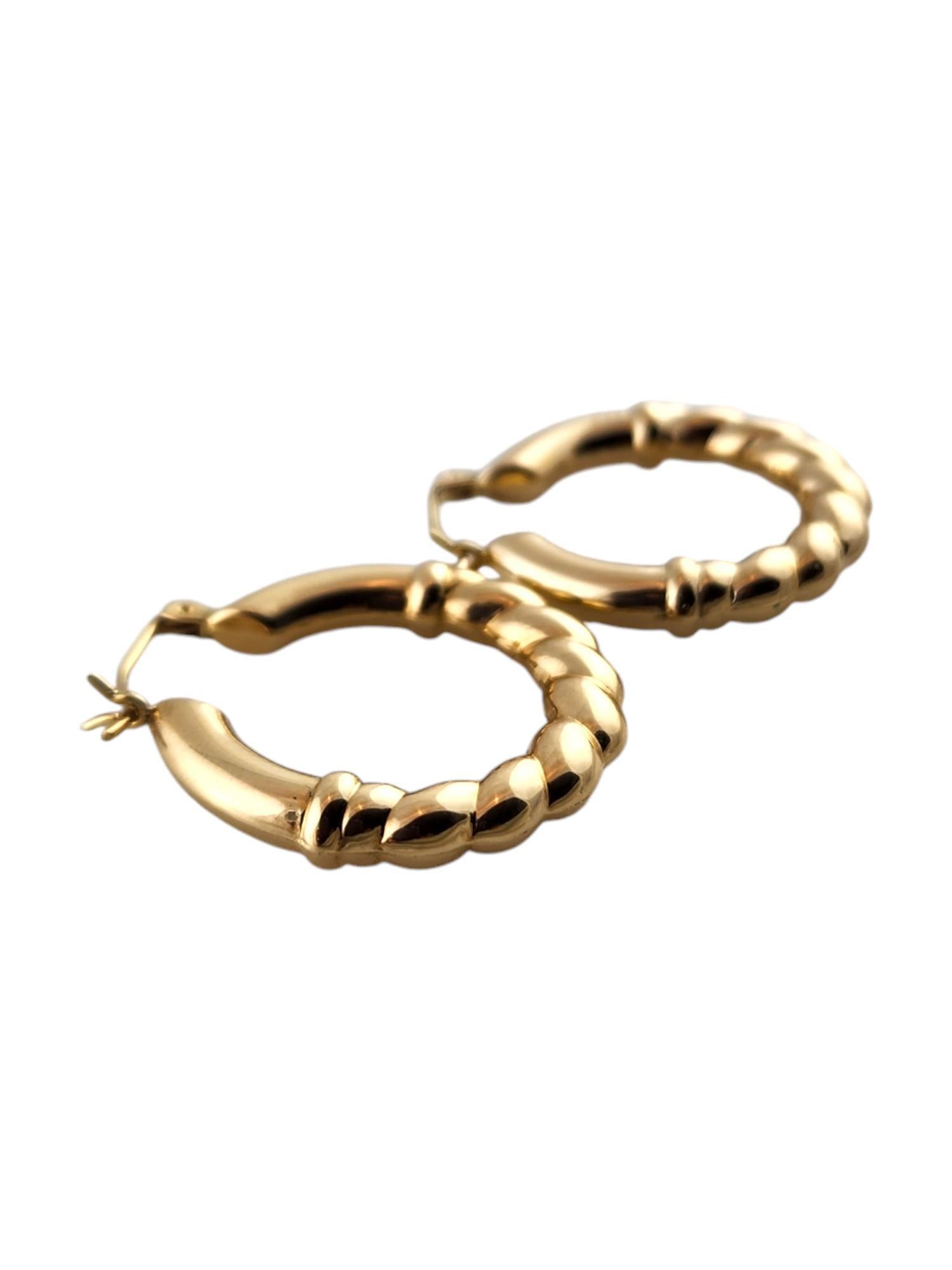 Women's 14 Karat Yellow Gold Twisted Gold Hoop Earrings #19137 For Sale